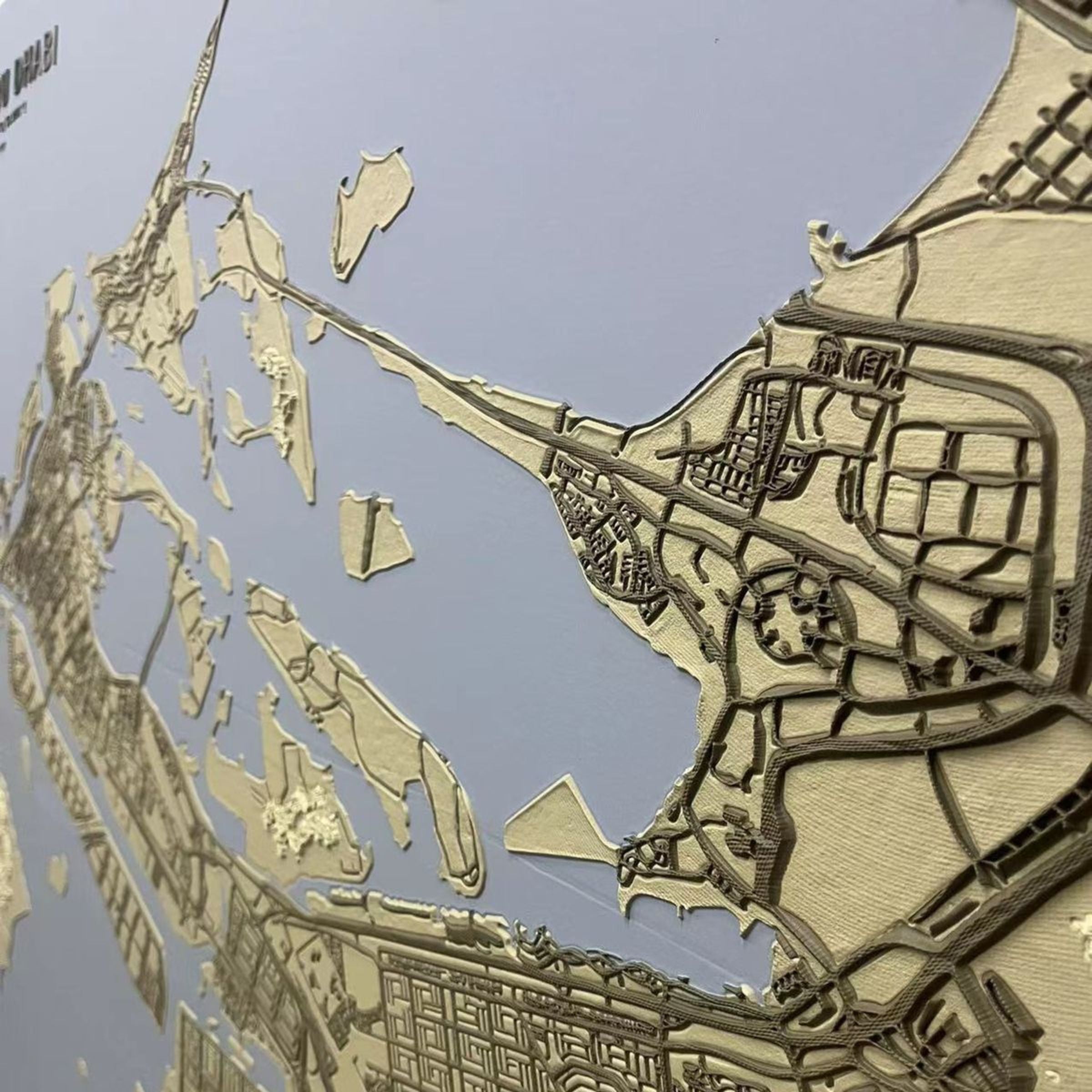 Handmade Abu Dhabi map painting, 140x140 cm, by BEACON, featuring detailed city artwork on canvas.