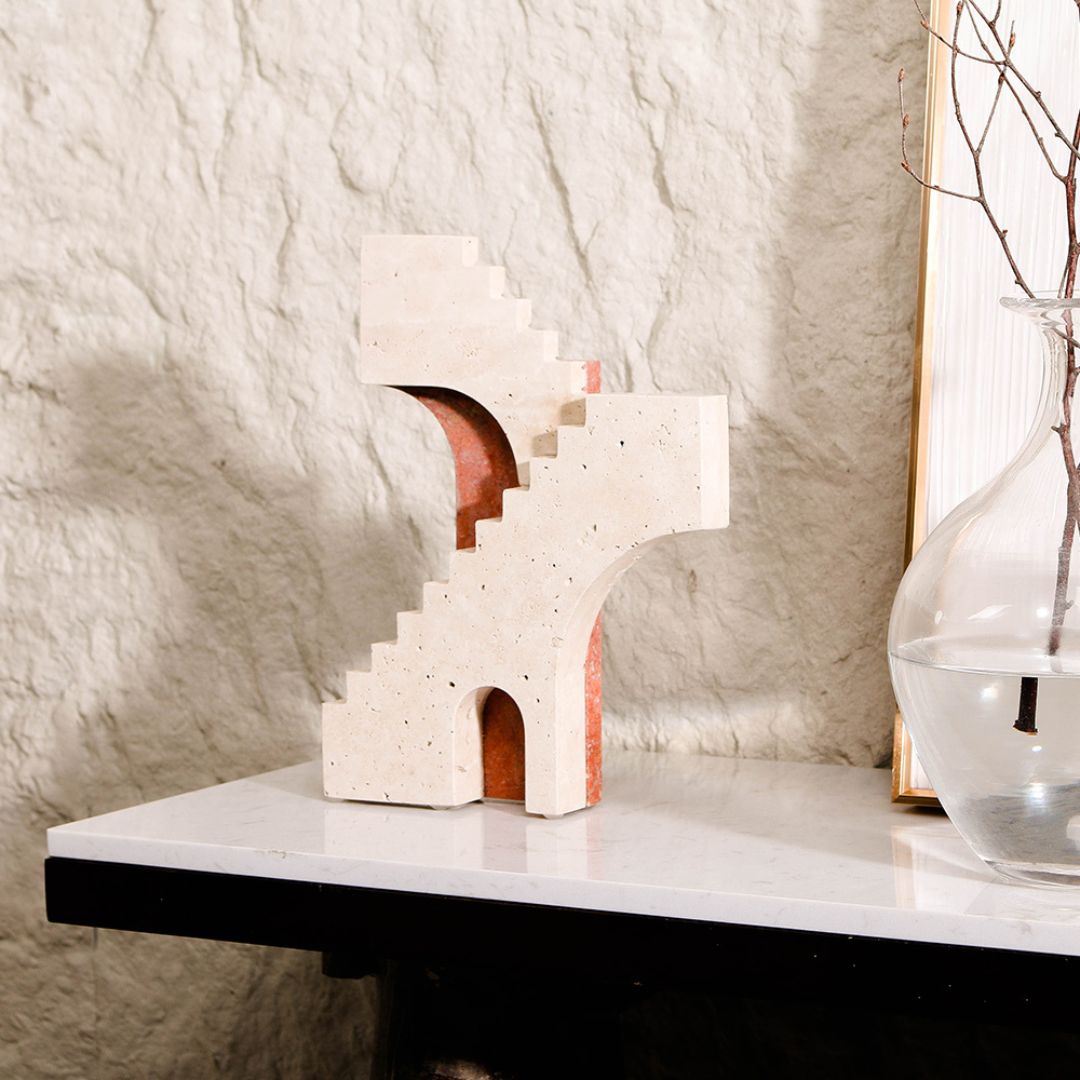 Abstract architectural sculpture by BEACON, modern home decor figurine with geometric design and sleek finish.