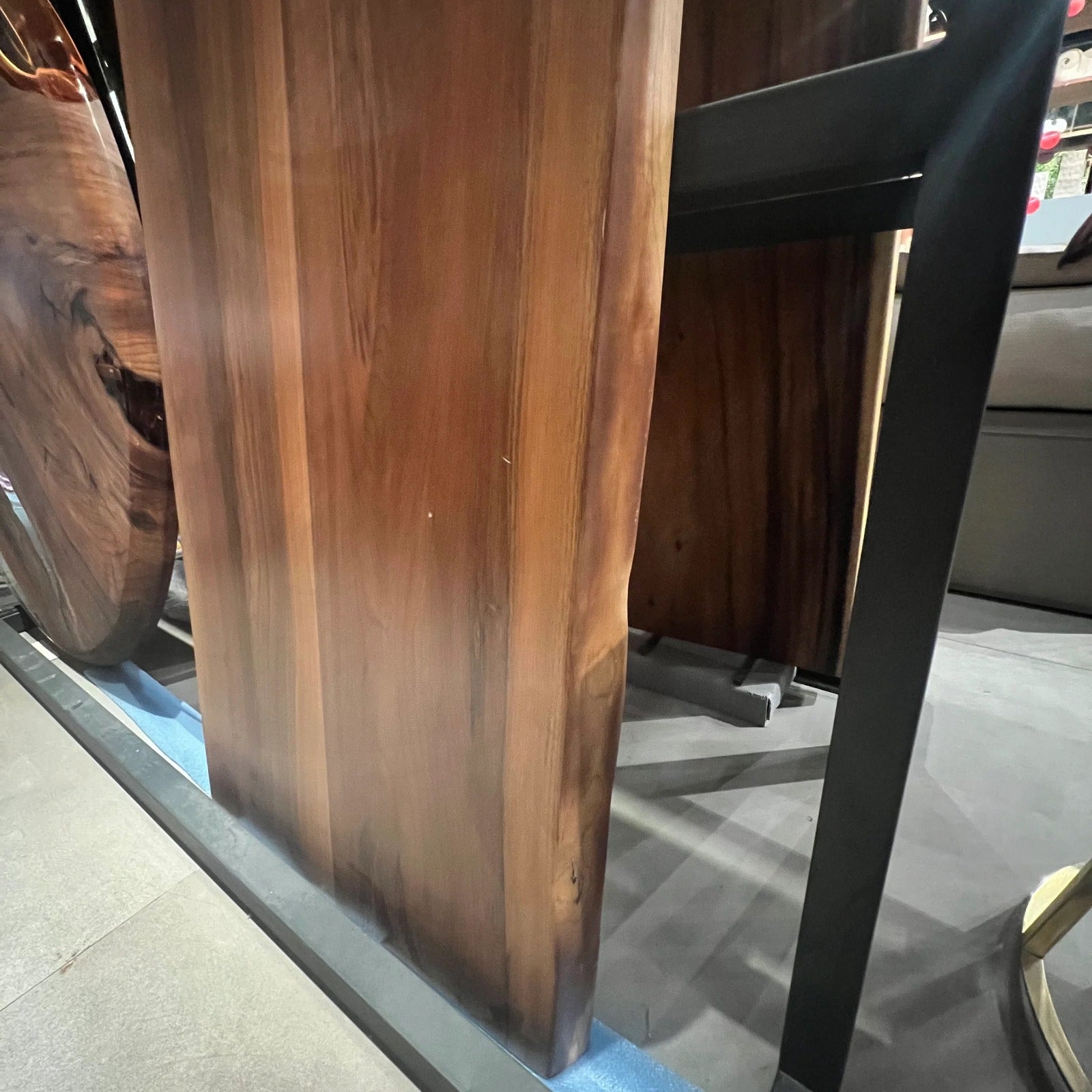 Live edge wooden dining table top by SANCREA, 140x70 cm, natural finish, display item with organic wood grain pattern.