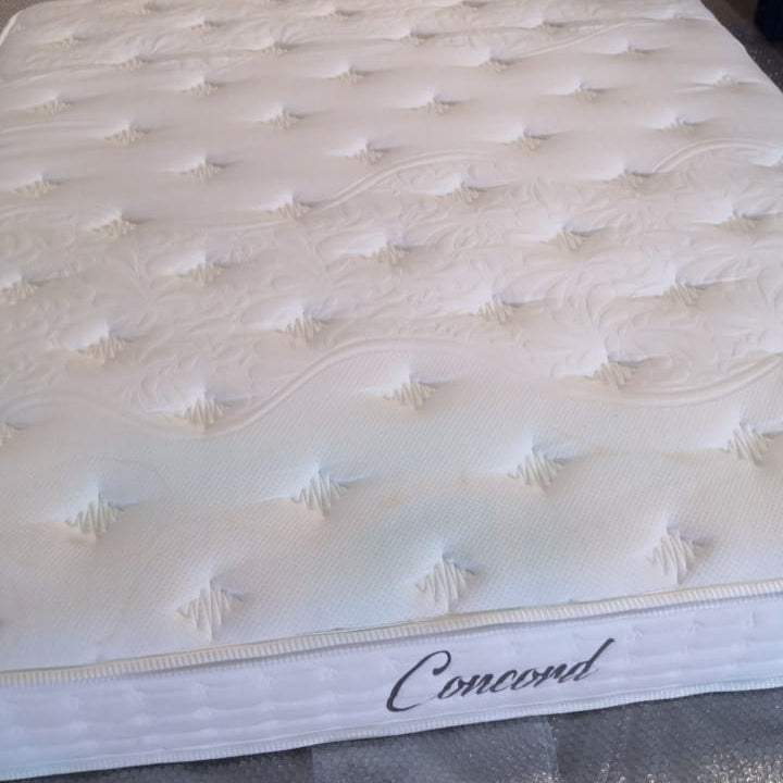 Display of Indivani Concord Queen Mattress in 160x200 cm size, showing the AS IS condition and mattress surface details.