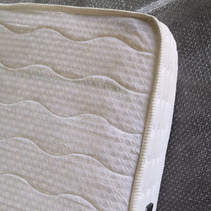 Display image of a 160x200 cm Indivani Concord Queen Mattress, showcasing its size and plush surface in a retail setting.