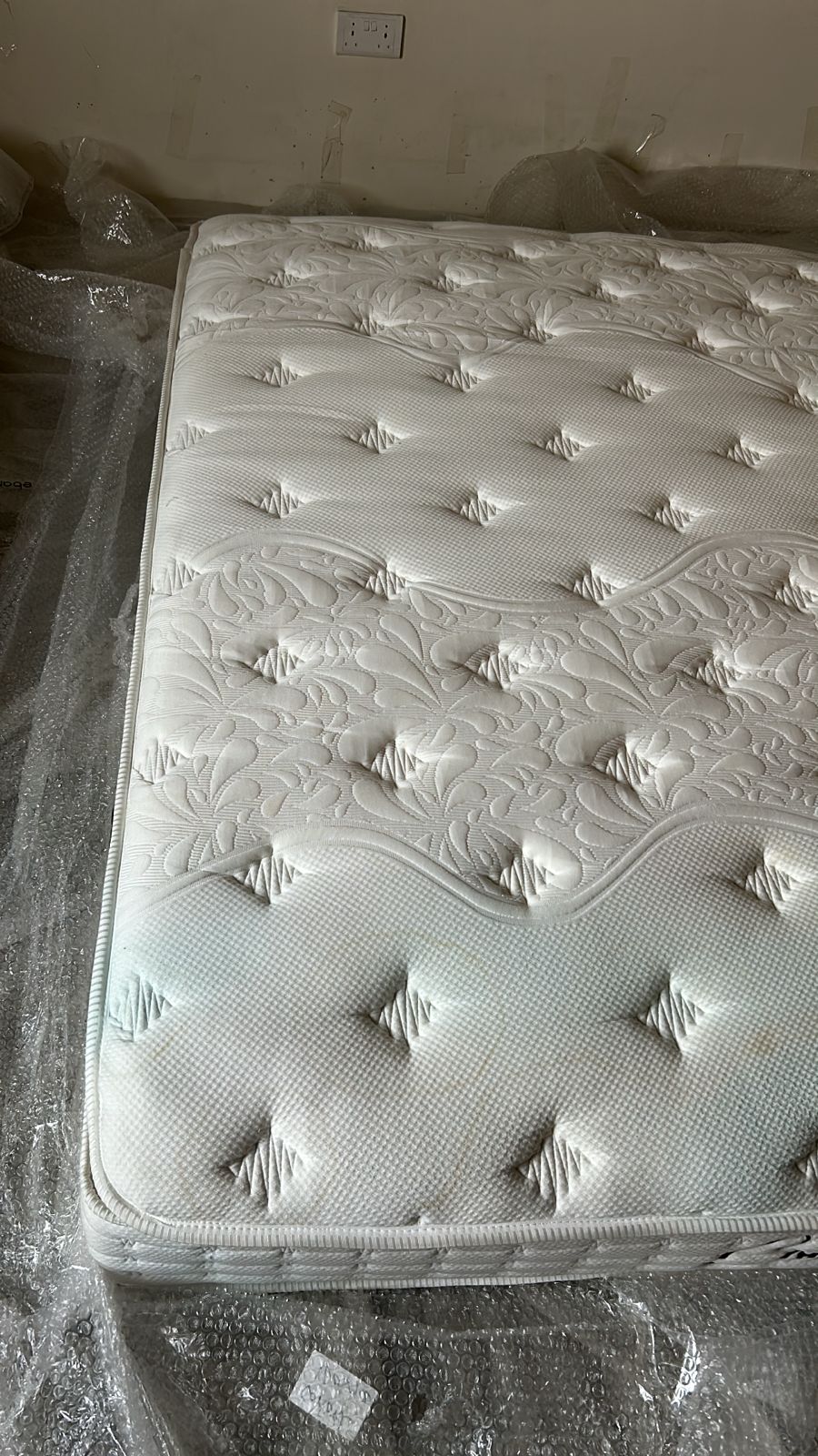 AS IS Indivani Concord queen mattress, 160x200 cm, display item with visible fabric texture and mattress edges.