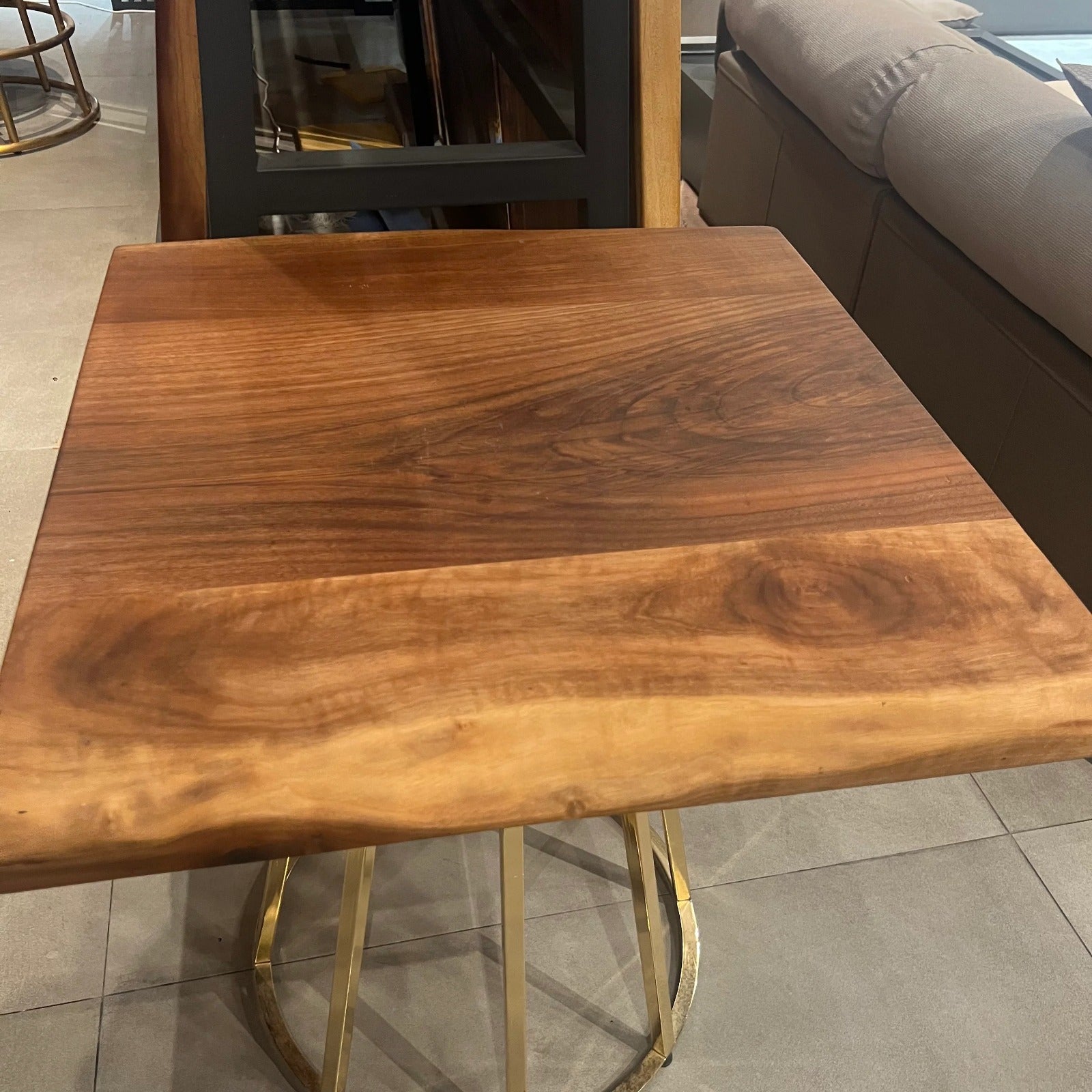 Live edge 70x70 cm dining table top by SANCREA, showcasing natural wood grain and rustic finish, display item.