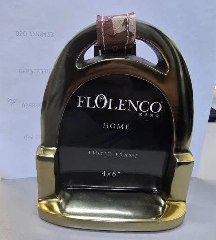 As-is aluminum and leather photo frame with display stand, showcasing a sleek, modern design for holding photographs.