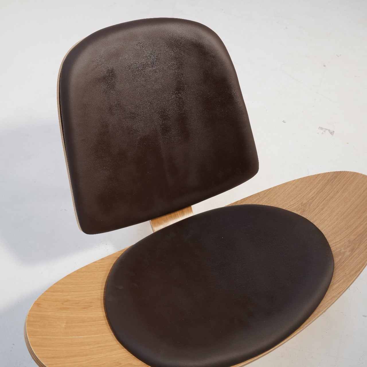 As-is Smile Lounge Chair by BEACON, display item with modern design and plush cushioning, shown in a neutral setting
