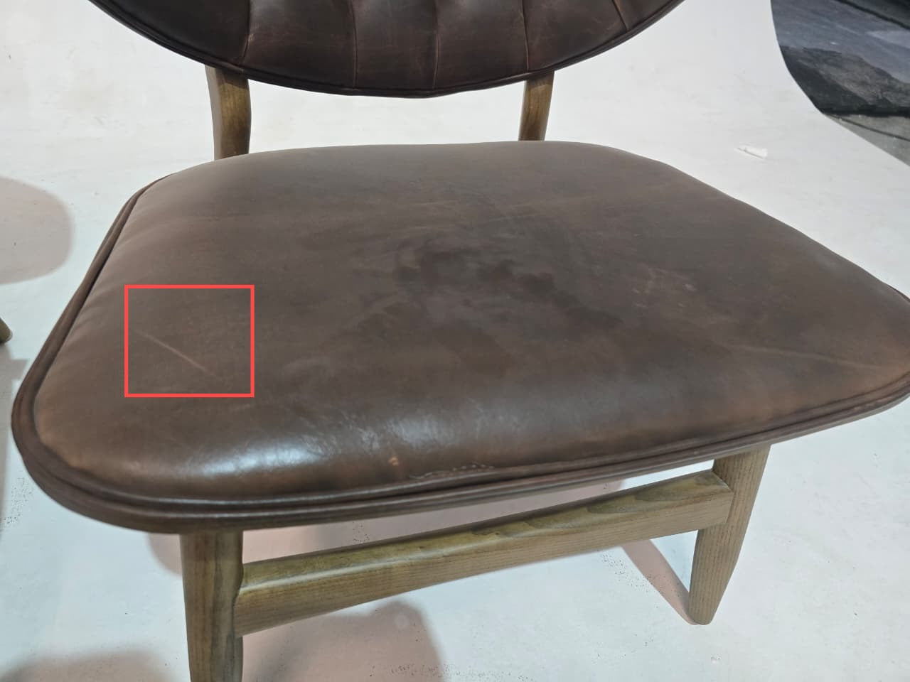 Vintage brown Flora Lounge Chair by OZZO, display item with a pull-up leather finish and classic design.