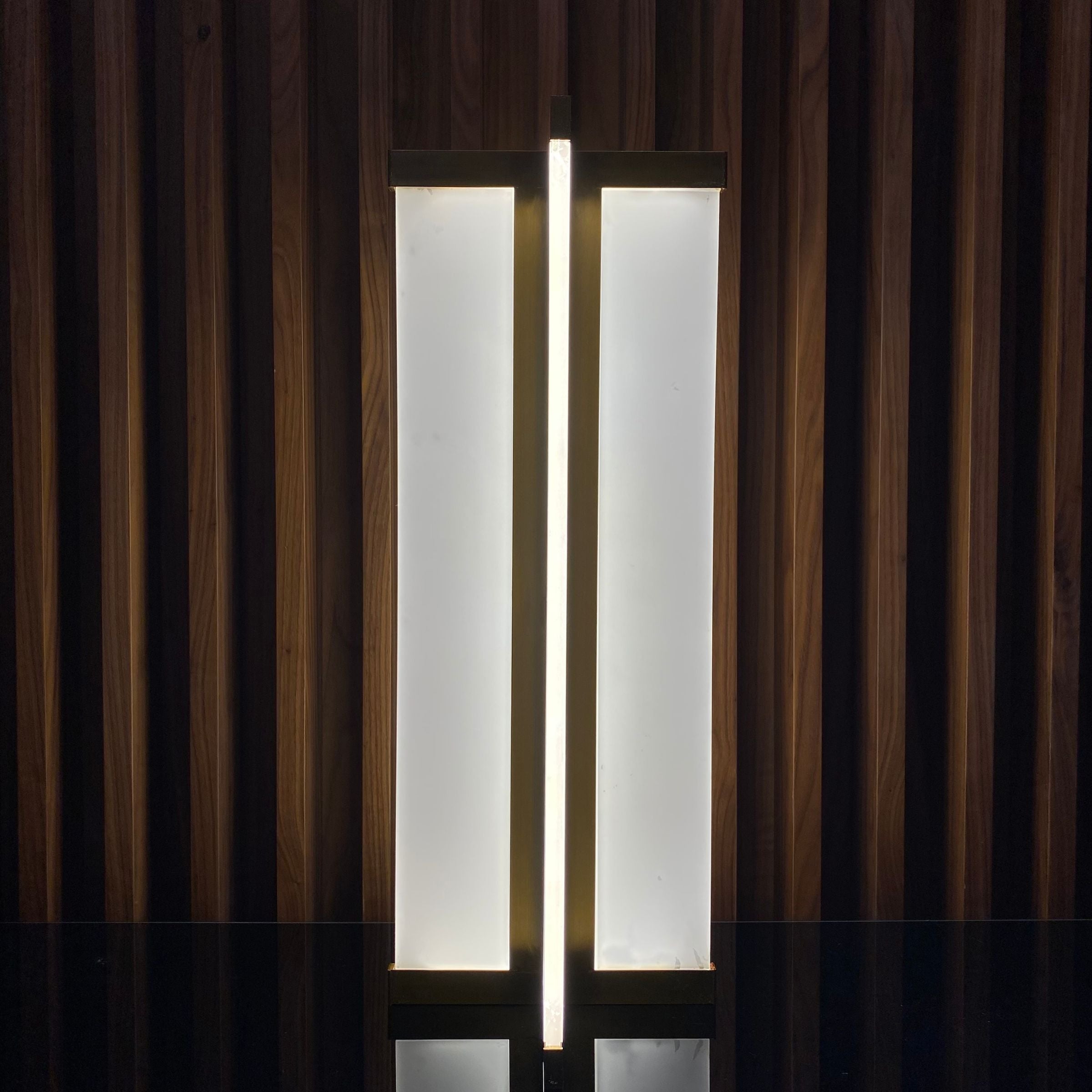 Golden table lamp by BEACON, display item with a sleek design, featuring a golden finish and modern style.