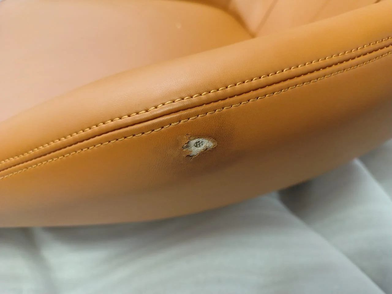 As-is Relax Lounge Chair LC035-Br by Beacon, display item showing a modern, cushioned lounge chair with fabric upholstery.