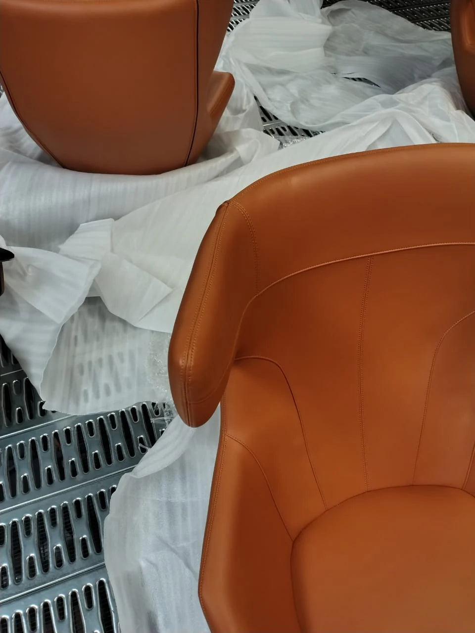 As-is Relax Lounge Chair LC035-BR by Beacon, displayed as a display item in a modern lounge setting.