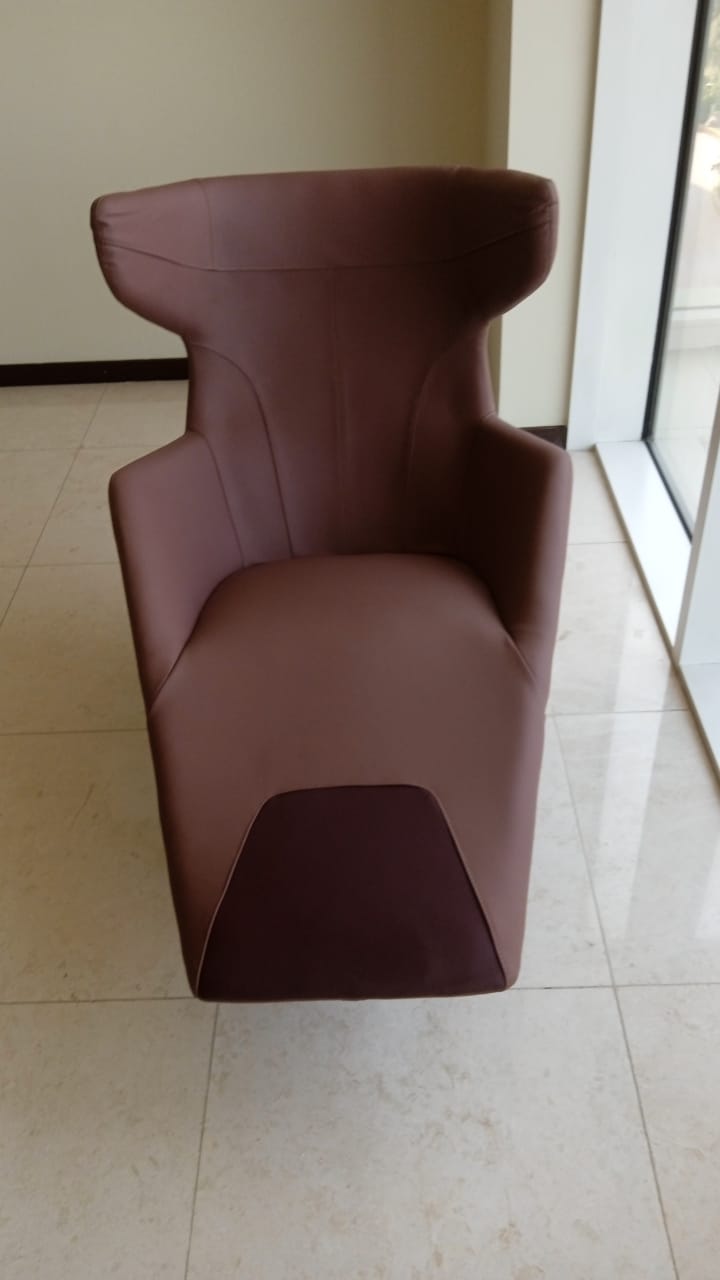 As-is Relax Lounge Chair LC035-P display item from Beacon, with cushioned seat and modern design, in a neutral fabric.