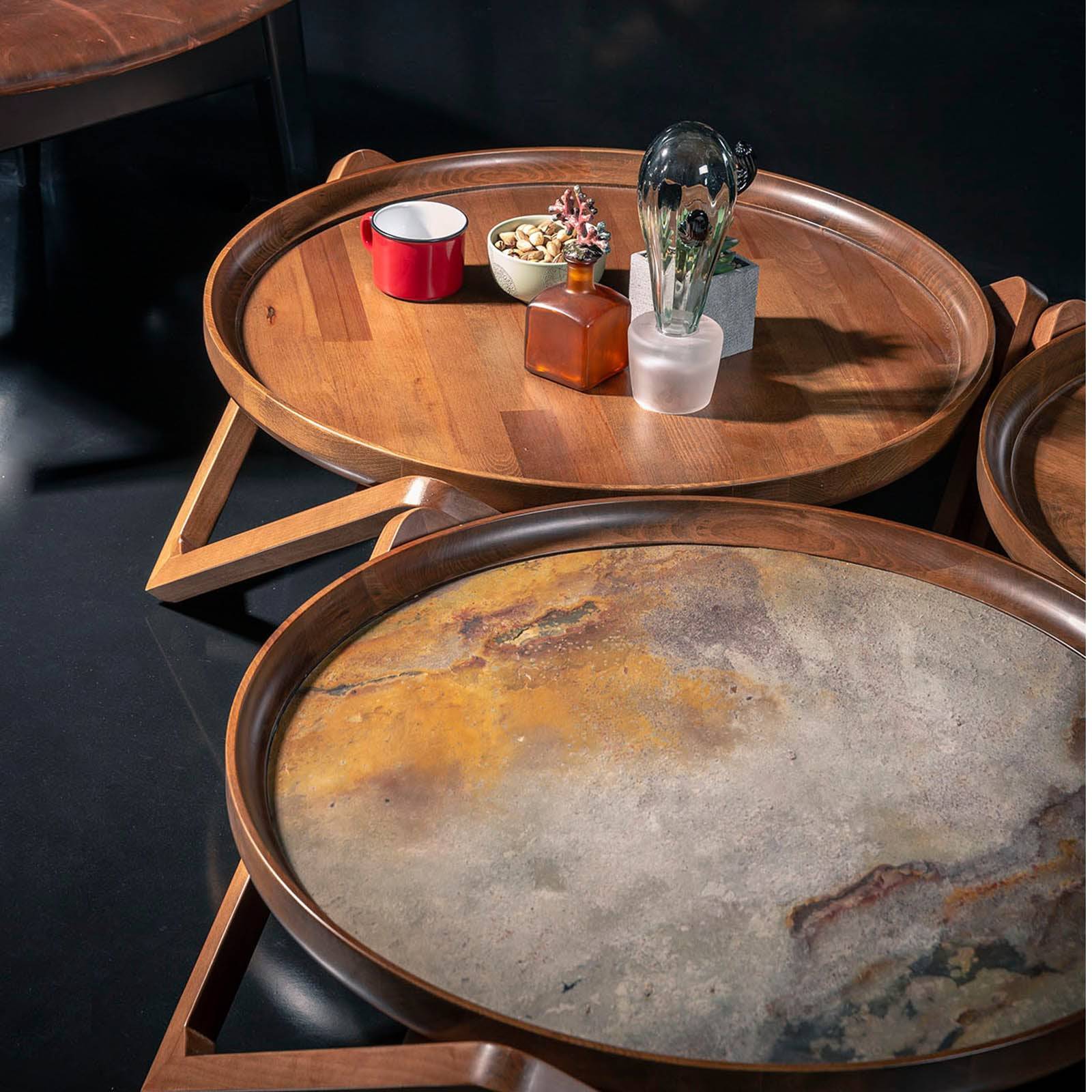 Set of three passion center tables by Togo Home Style, showcasing modern display tables with sleek design and varied heights.
