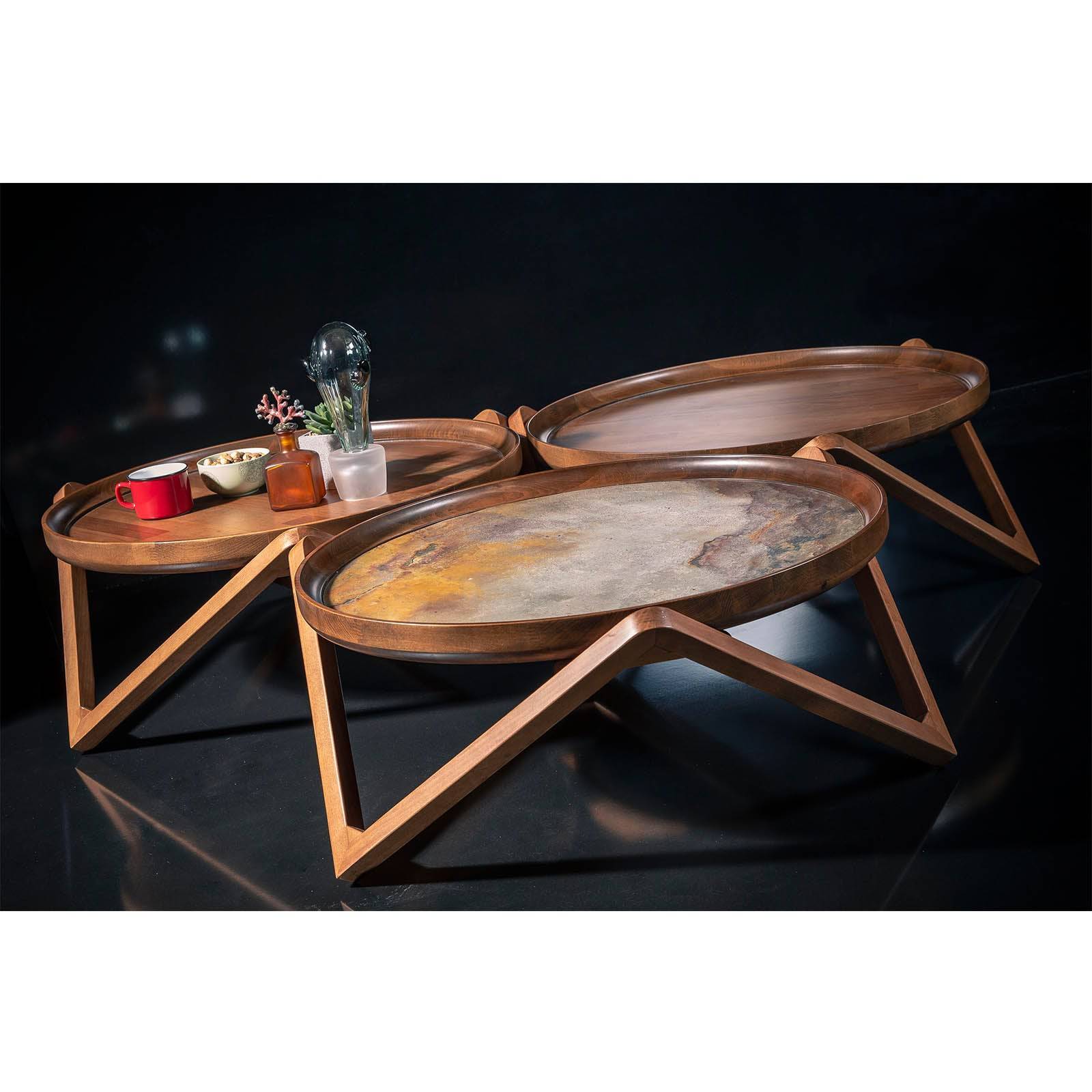 Set of three Passion Center Tables by Togo Home Style, displayed as-is, showing their unique modern design and varying heights.