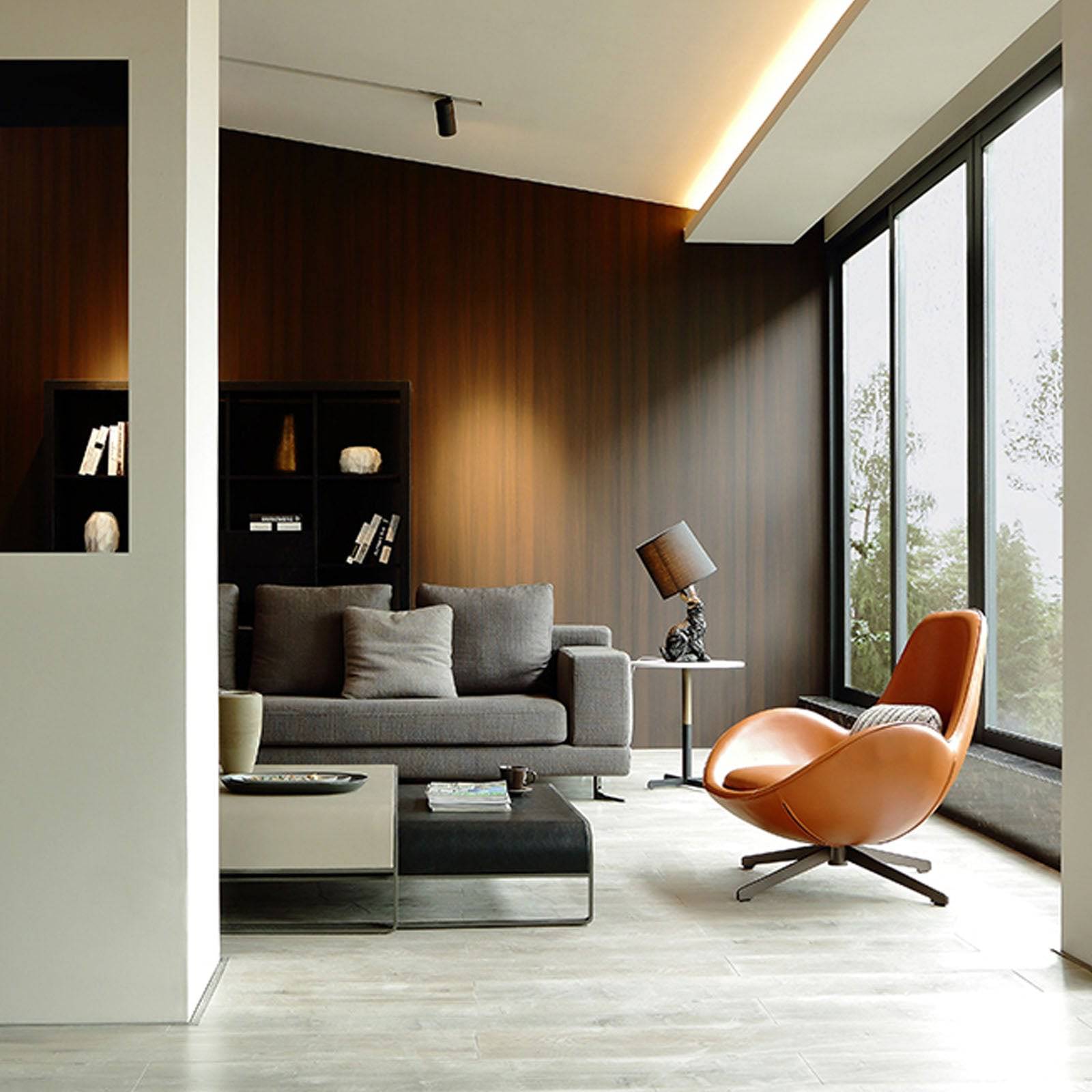 As-is Vigo swivel lounge chair by Beacon, displayed with modern design and cushioned seating, in a showroom setting.