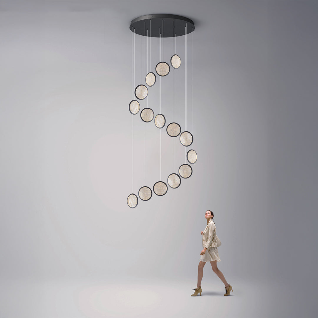 Aurisone pendant lamp MA05915P-015 by BEACON, modern pendant lamp with sleek design and metallic finish, hanging indoors.