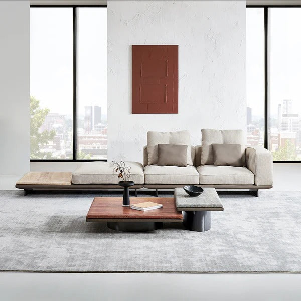 A beige BEACON Avenor 3-seater sofa with integrated side table, modern design, and plush cushions.