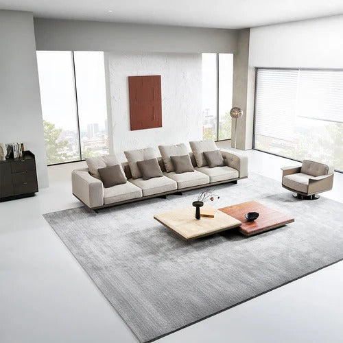 A beige BEACON Avenor 4-seater sofa with plush cushions and modern design, shown in a living room setting.