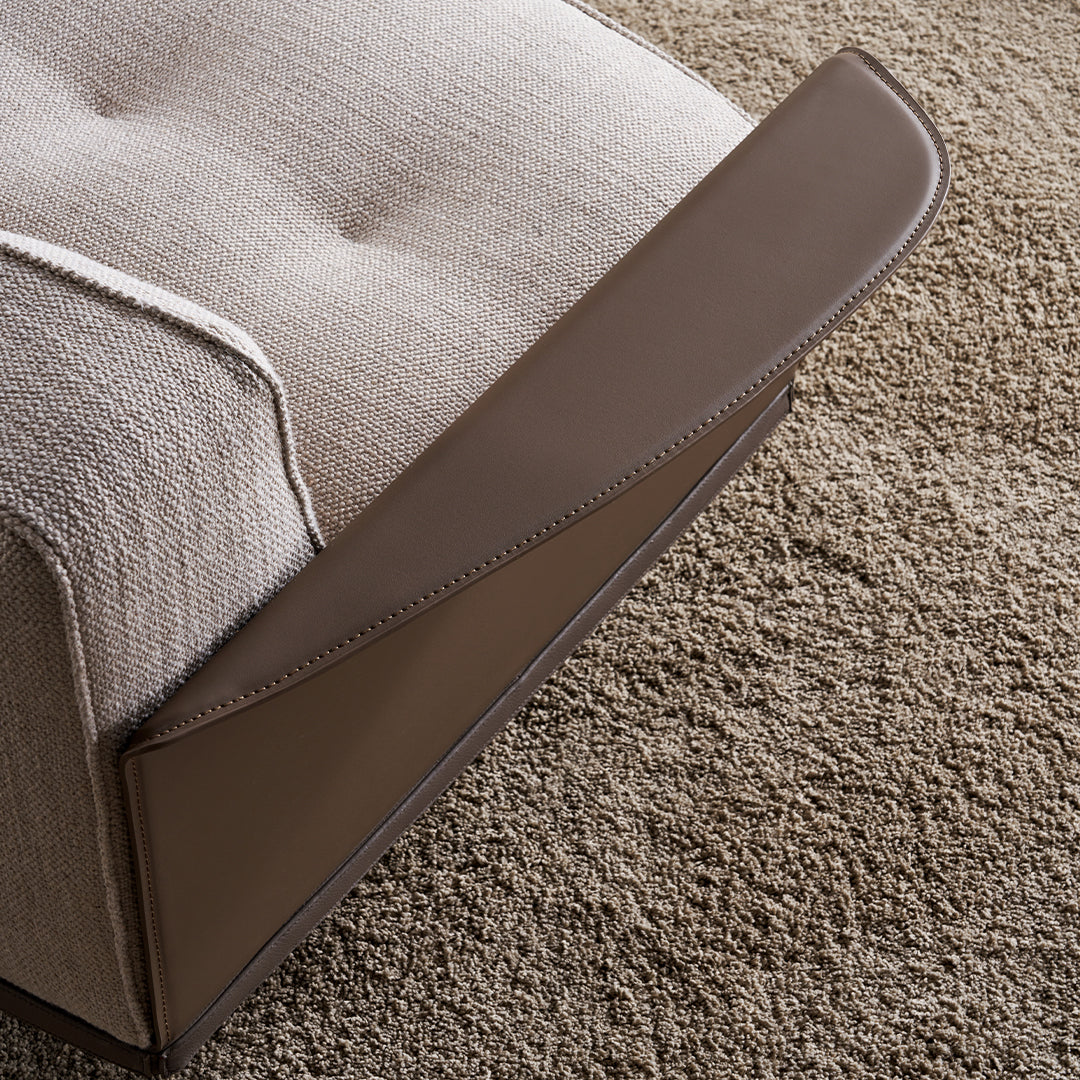 A beige BEACON Avenor armchair with wooden legs, plush fabric upholstery, and a modern, comfortable design.