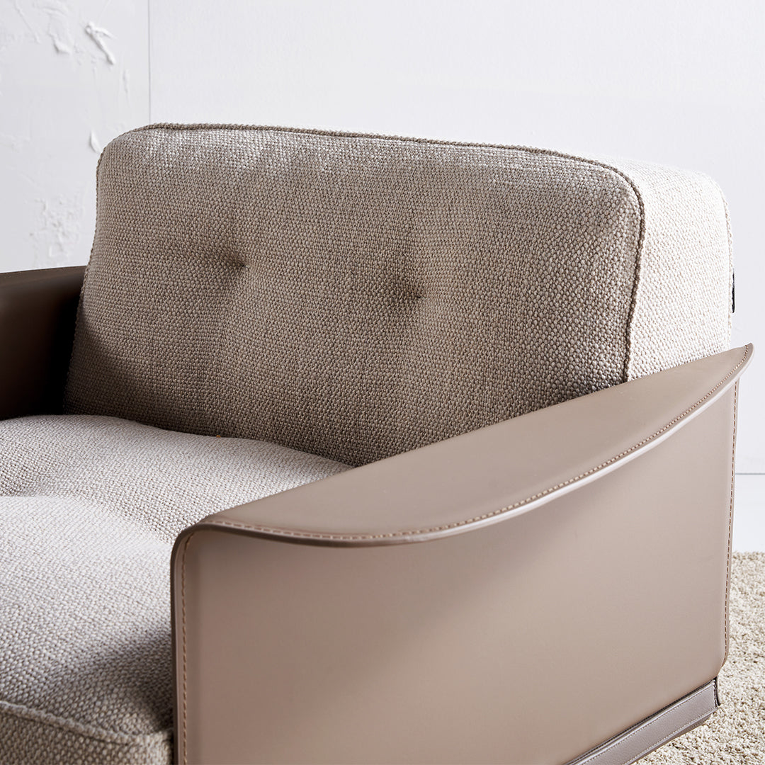 Avenor armchair by BEACON featuring a modern design with soft fabric upholstery and comfortable cushioning.