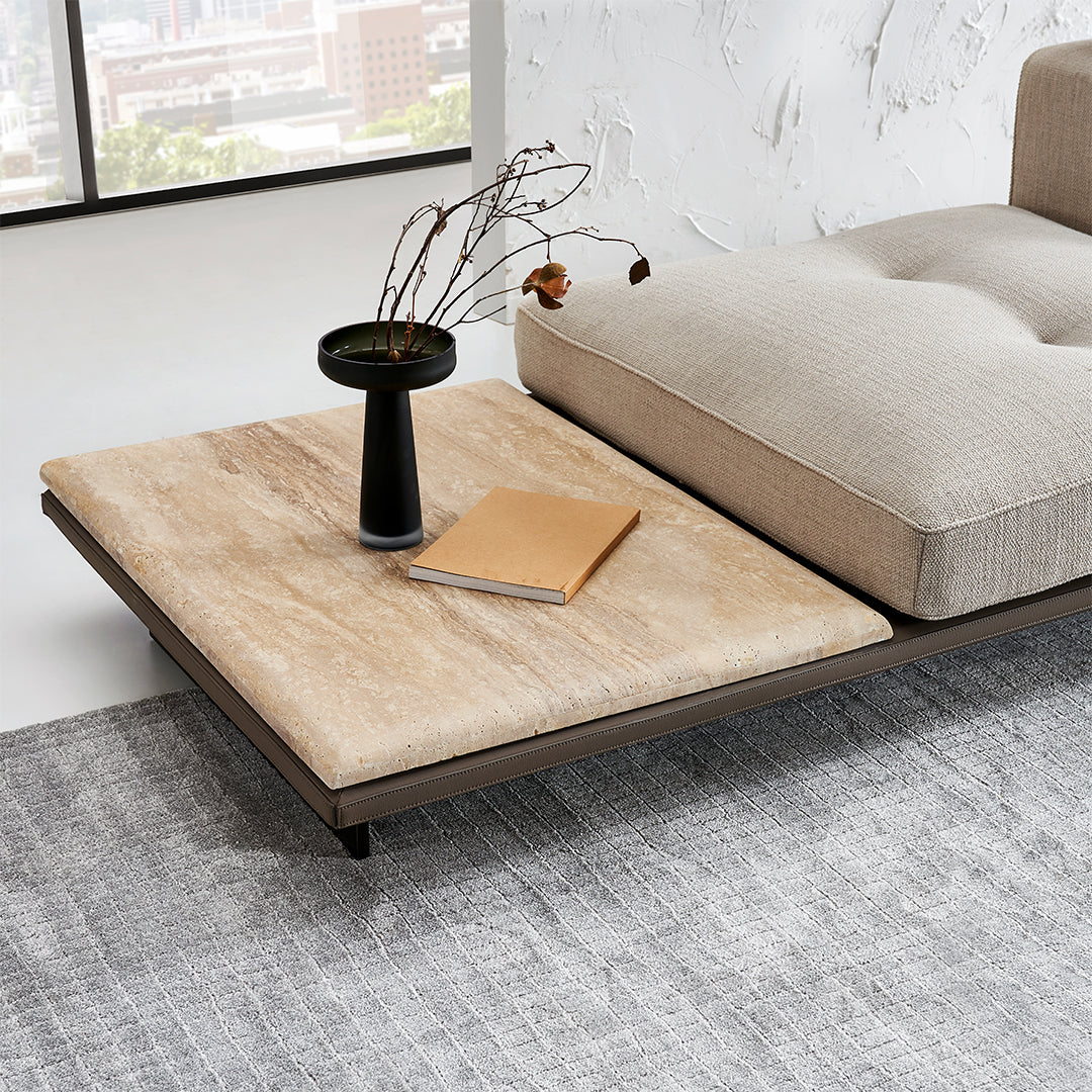 Avenor modular pouf with side table by BEACON, featuring a comfortable fabric top and sturdy wooden side table in modern design.