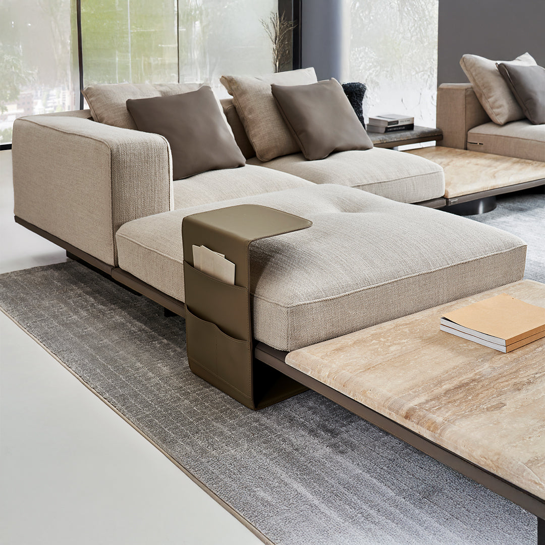 Avenor modular pouf with side table by BEACON, featuring a cushioned seating area and integrated side table in a modern design.