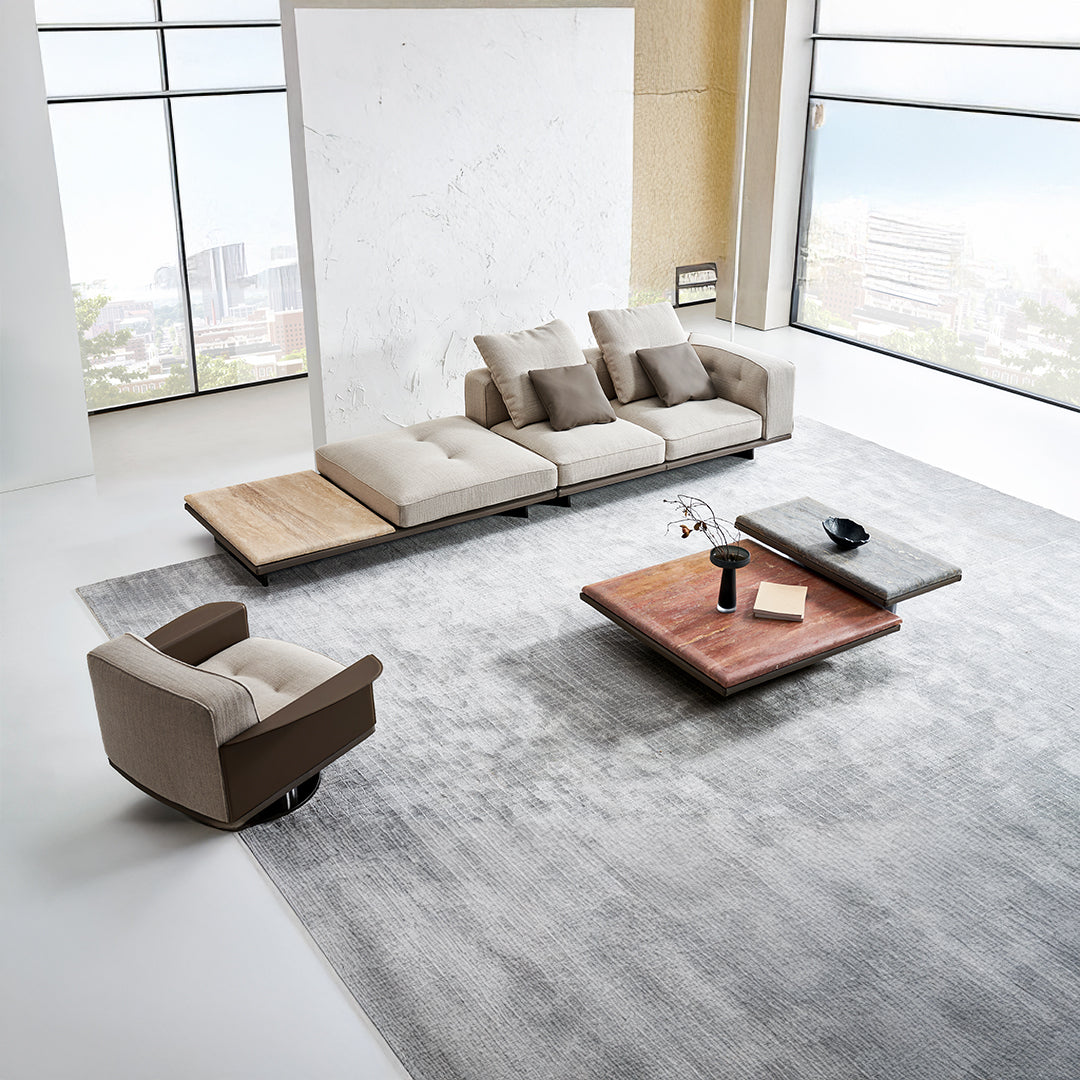 Avenor modular pouf with integrated side table from BEACON, featuring a contemporary design and neutral fabric upholstery.