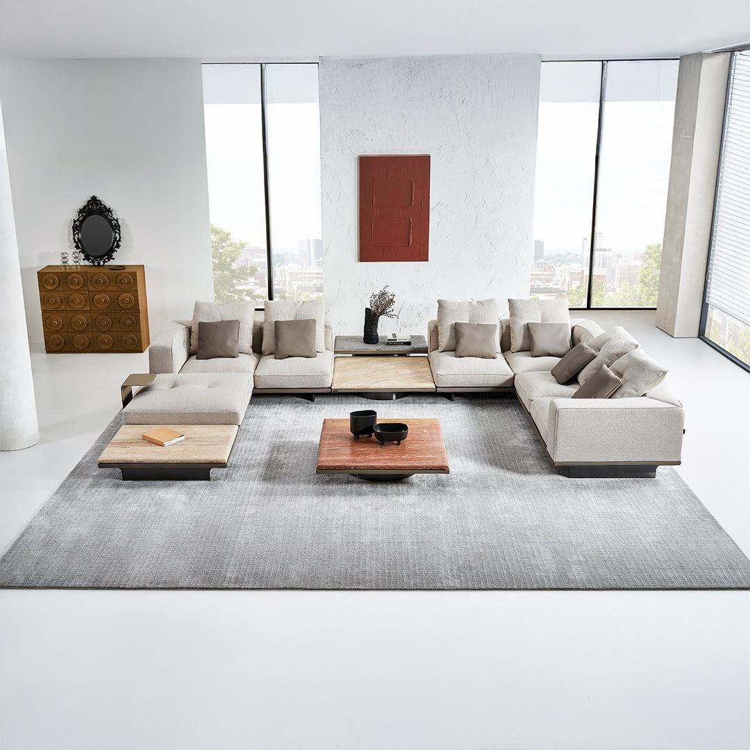 Avenor modular pouf with side table by BEACON, featuring a contemporary design, soft fabric surface, and integrated side table.