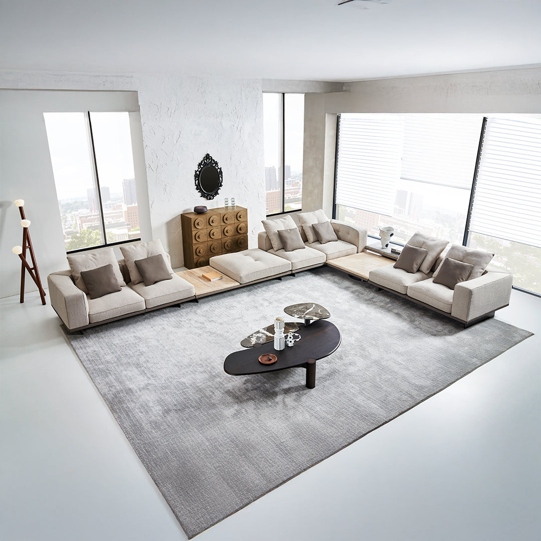 Avenor modular pouf with side table by BEACON, stylish living room setup featuring a versatile seating and table combination.