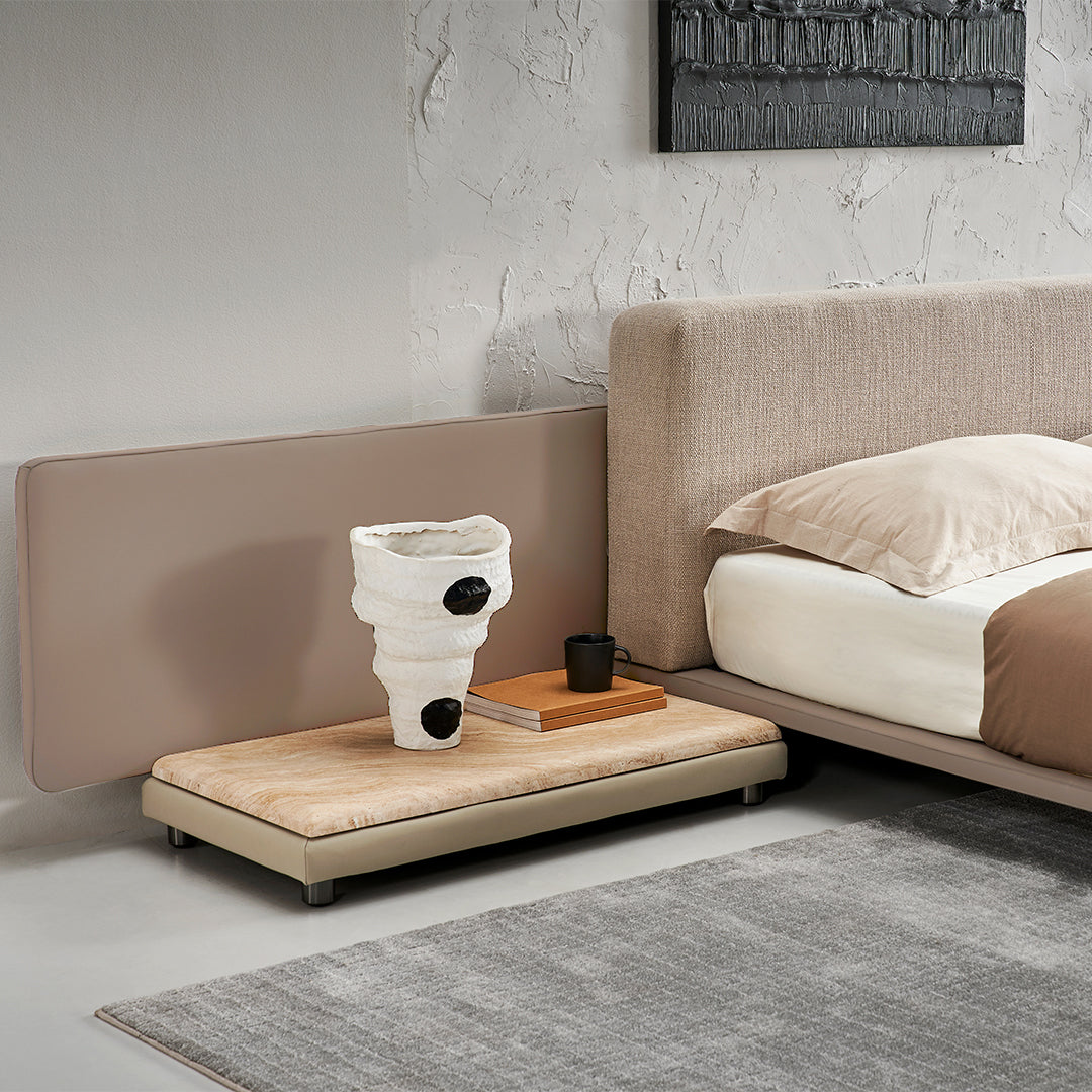 Avenor suspended king size bedstead by BEACON, with a modern design and sturdy frame, shown in a well-lit bedroom setting.