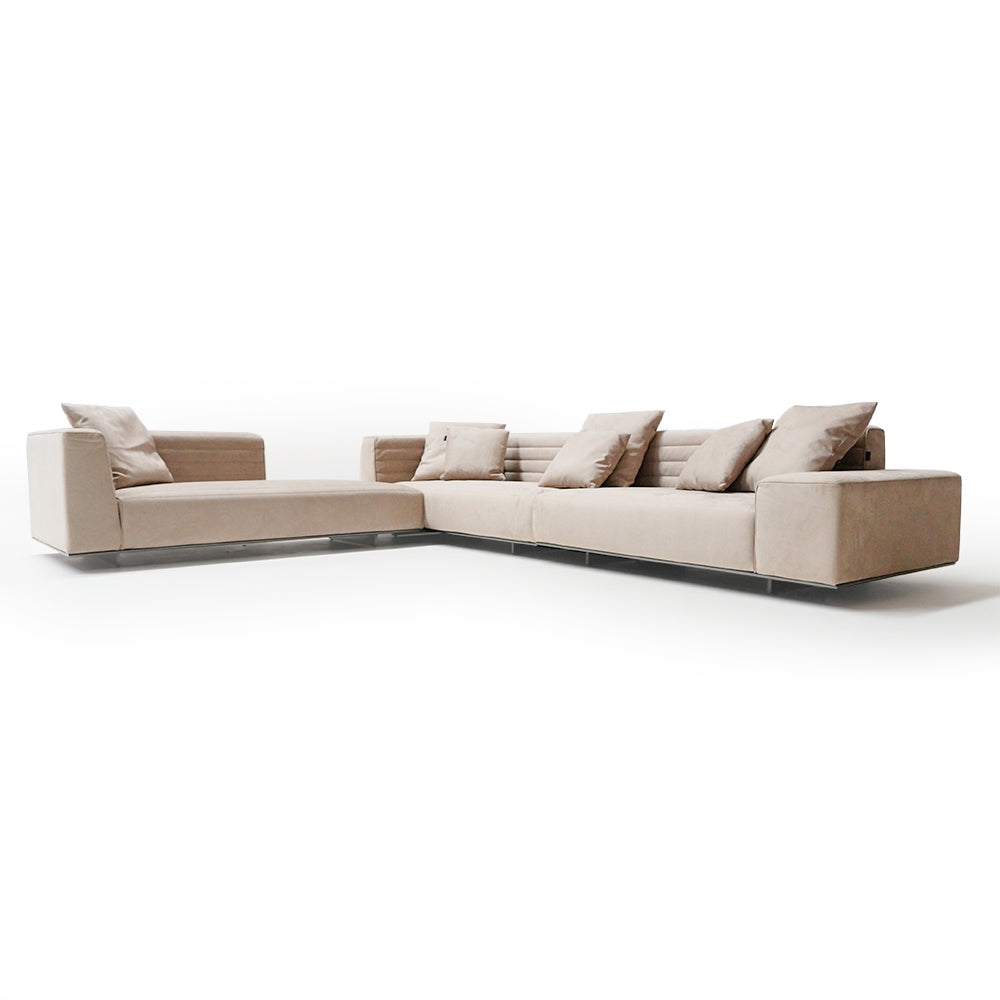 White Baxter corner sofa set by BEACON, featuring plush cushions and modern design, perfect for living room comfort.