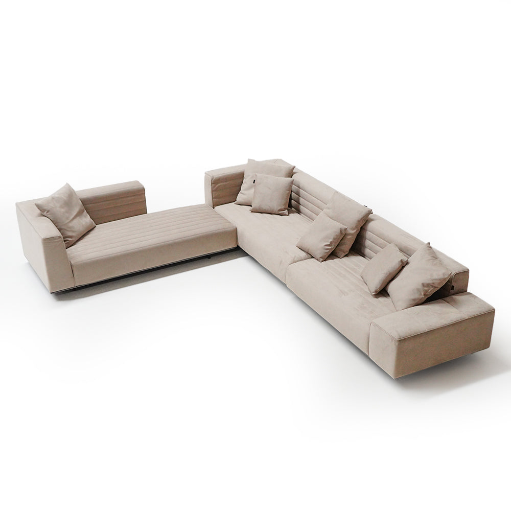White Baxter corner sofa set by BEACON with plush cushions and modern design, perfect for living room comfort.