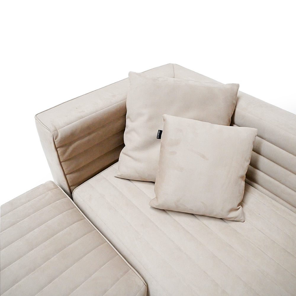 White Baxter corner sofa set by BEACON, featuring plush cushions and modern design, perfect for stylish living room seating.