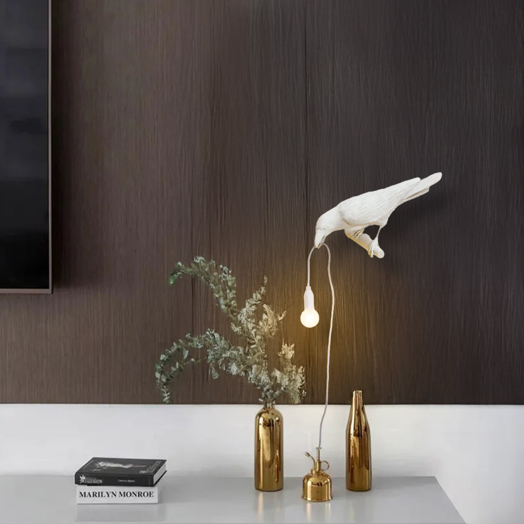 Beige bird wall lamp by BEACON, decorative wall-mounted light fixture with bird design and soft beige finish.