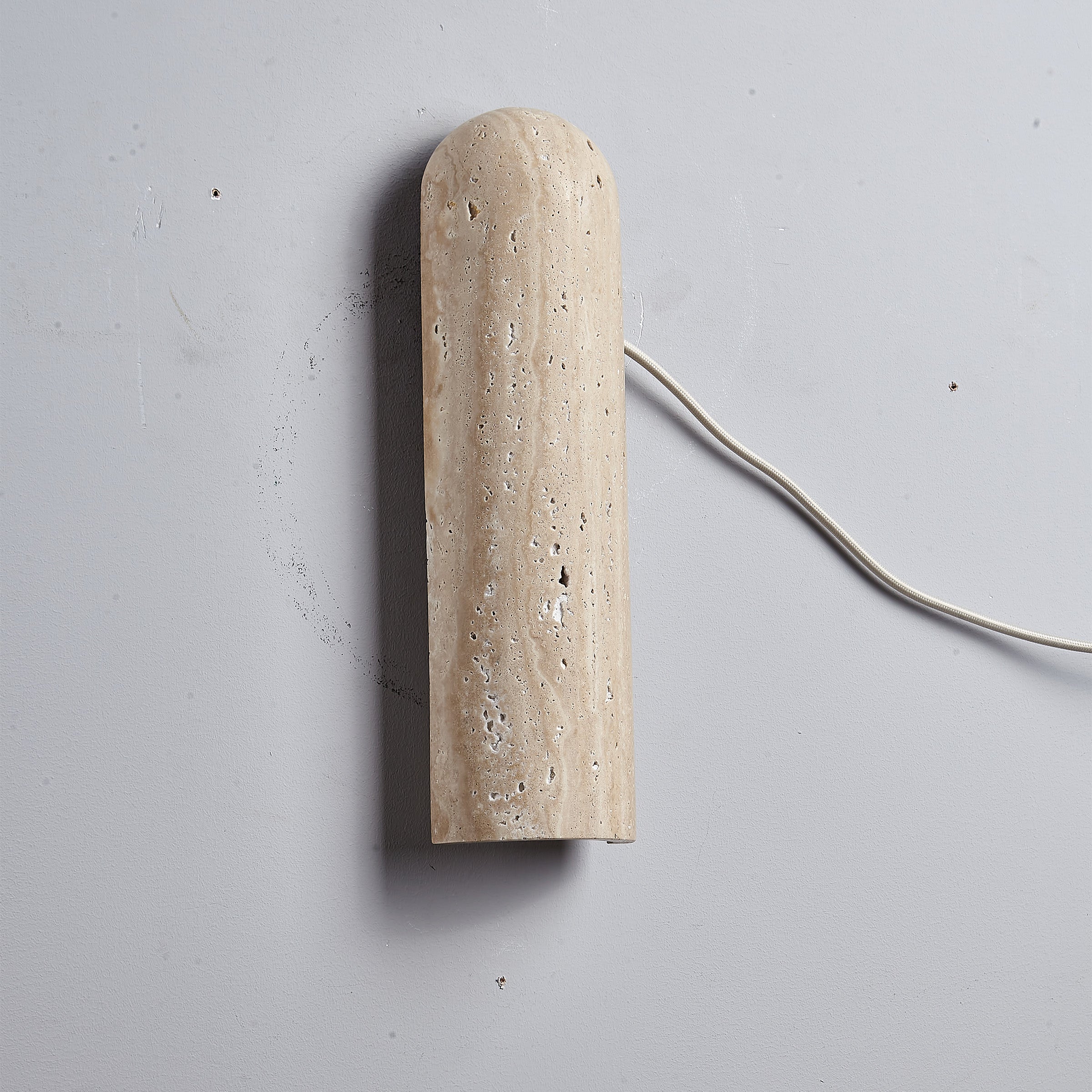 Beige natural travertine marble wall lamp by BEACON, featuring a sleek wall-mounted design and elegant stone finish.