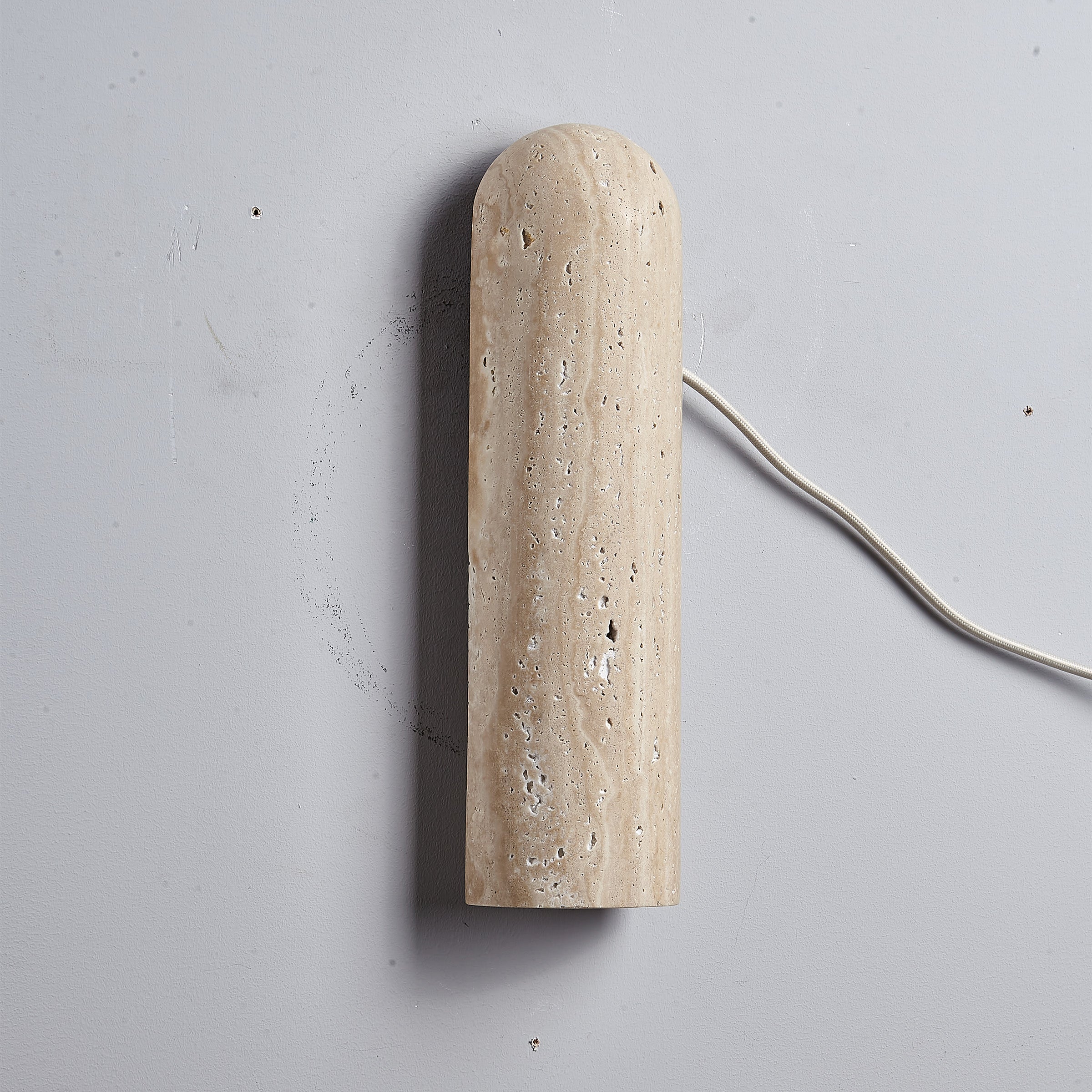 Beige natural travertine marble wall lamp by BEACON, featuring a sleek wall-mounted design with elegant marble finish.