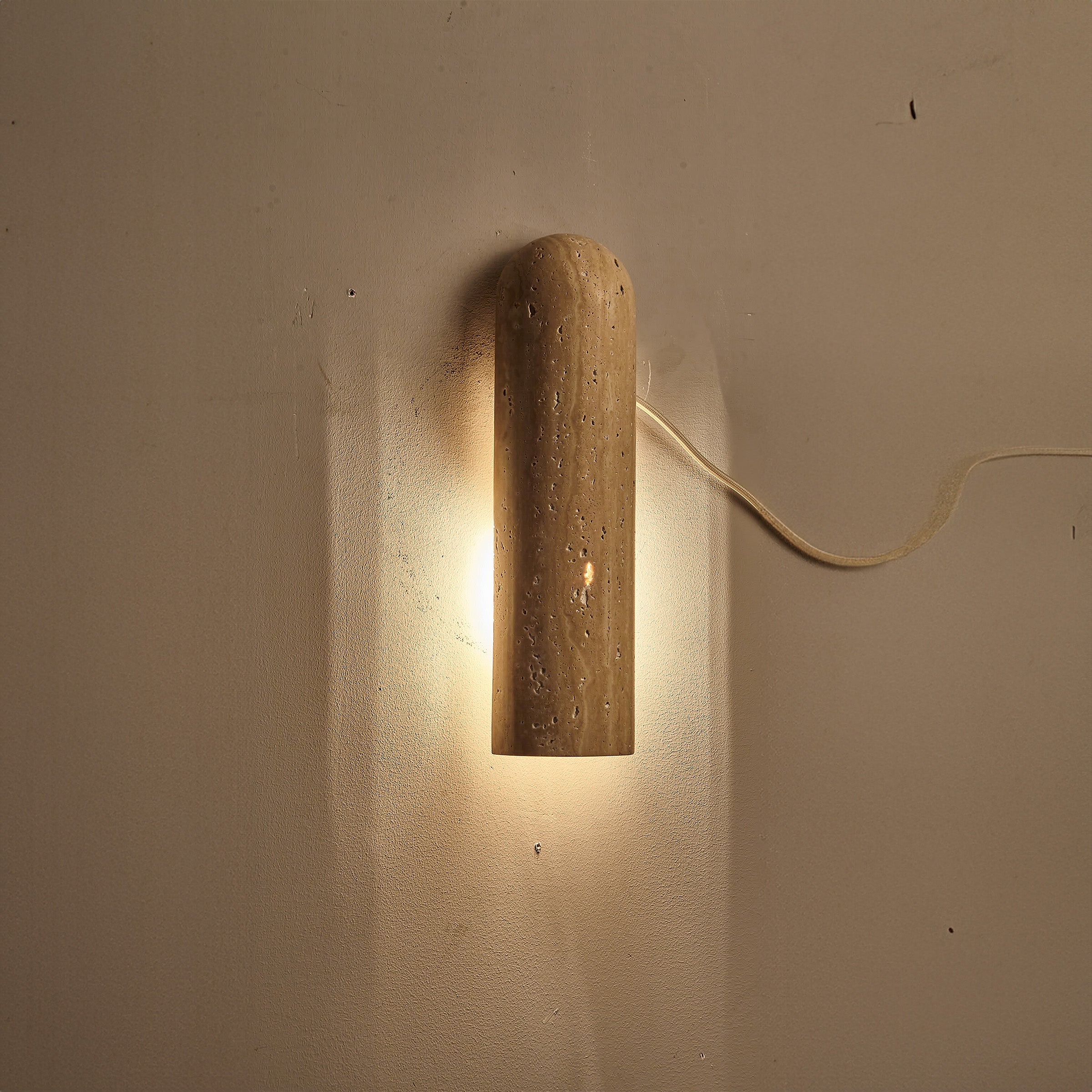 Beige natural travertine marble wall lamp by BEACON, modern wall-mounted lighting fixture with elegant stone finish.