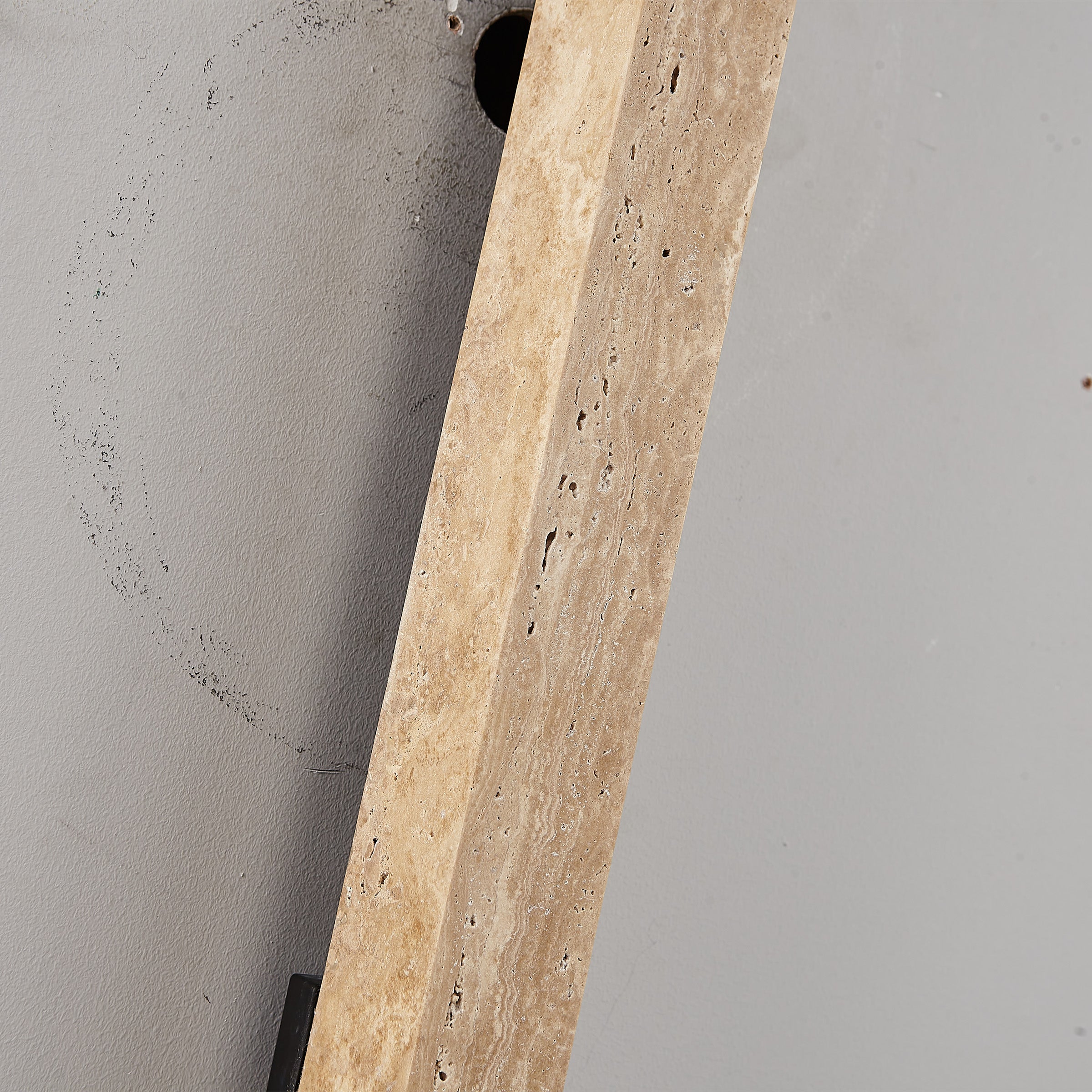 Beige natural travertine marble wall lamp by BEACON, featuring a sleek, modern design perfect for contemporary interiors.