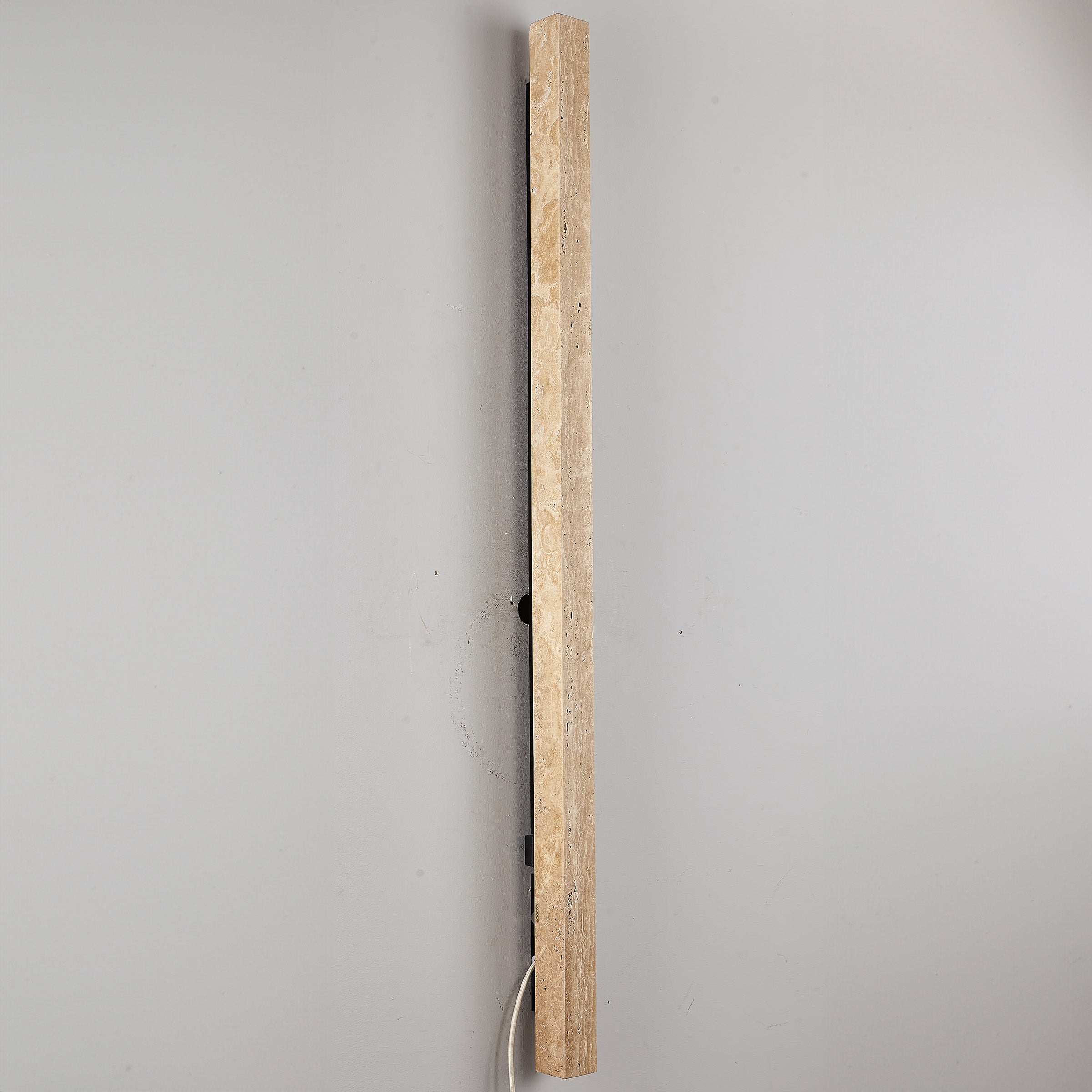 Beige natural travertine marble wall lamp by BEACON JIADG, featuring a sleek rectangular design with warm illumination.