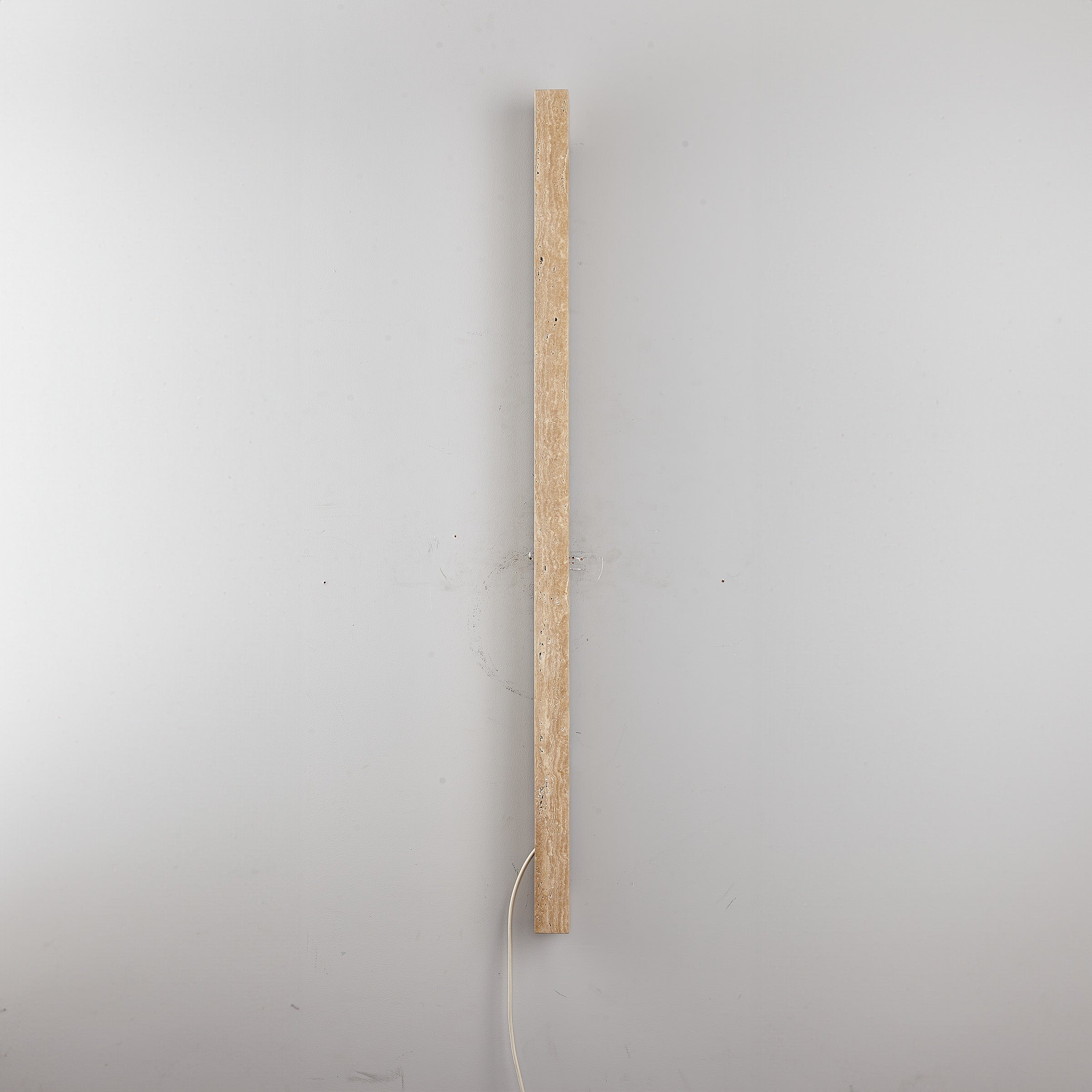 Beige natural travertine marble wall lamp by BEACON JIADG, featuring a sleek rectangular design and warm lighting.