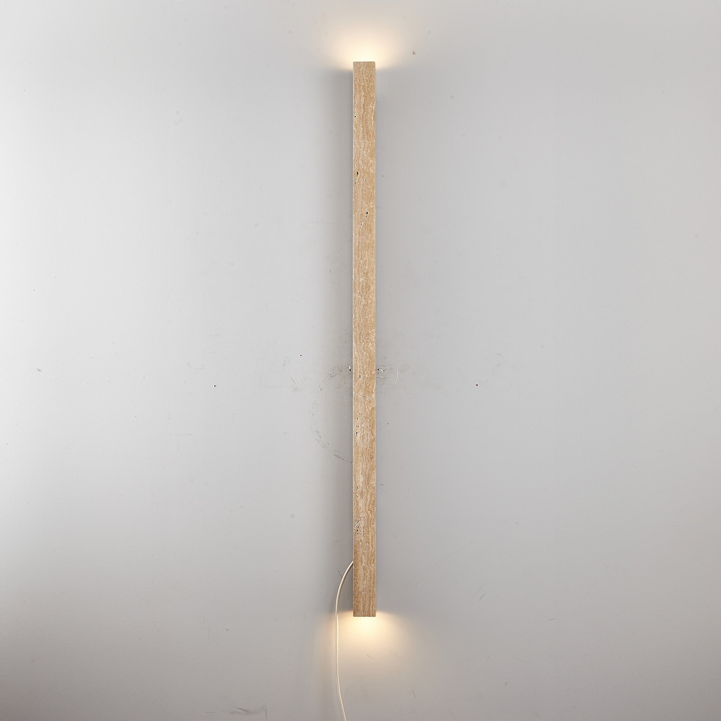 Beige natural travertine marble wall lamp by BEACON (JIADG), featuring a sleek wall-mounted design and modern lighting style.