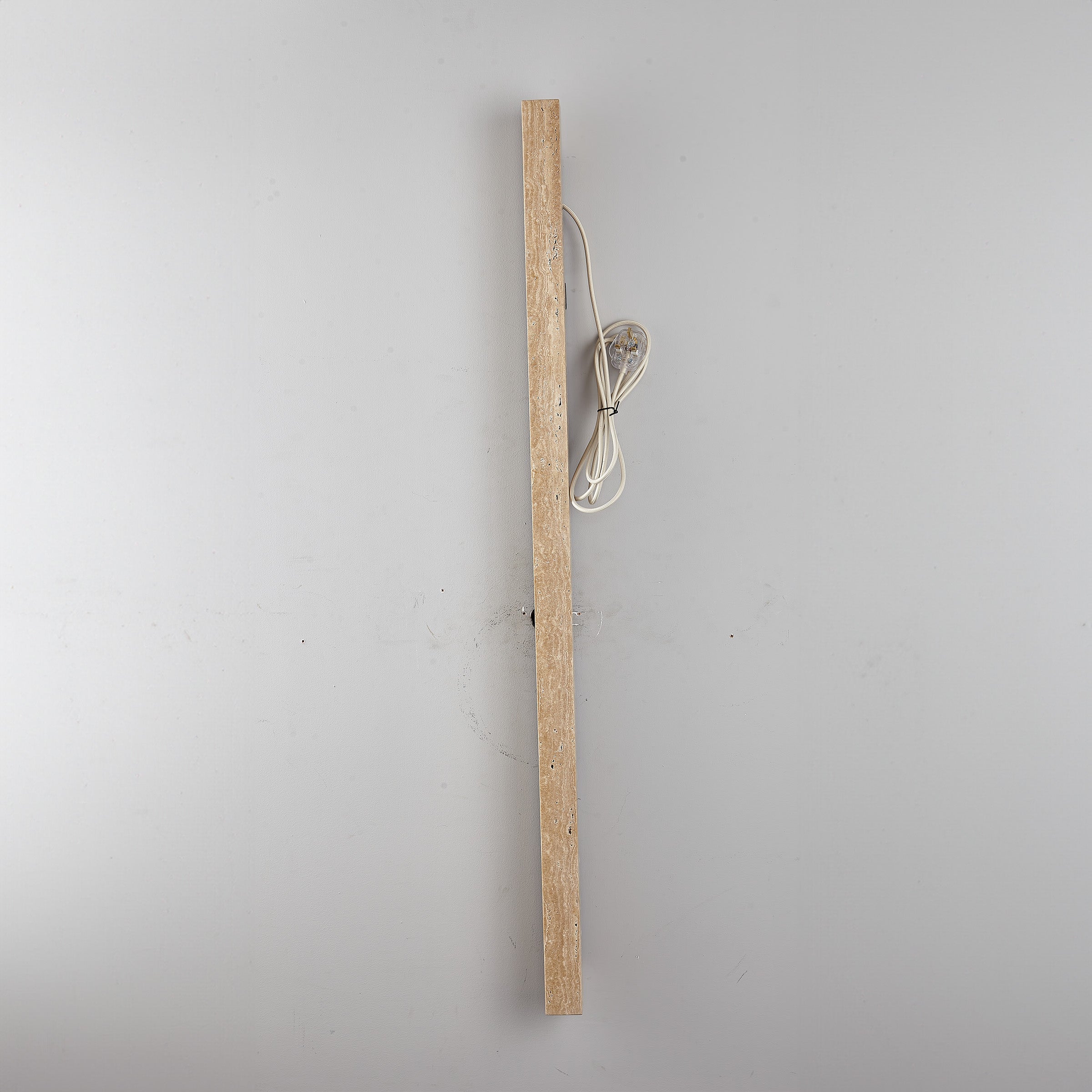 Beige natural travertine marble wall lamp by BEACON, stylish wall-mounted lighting fixture with elegant stone finish.