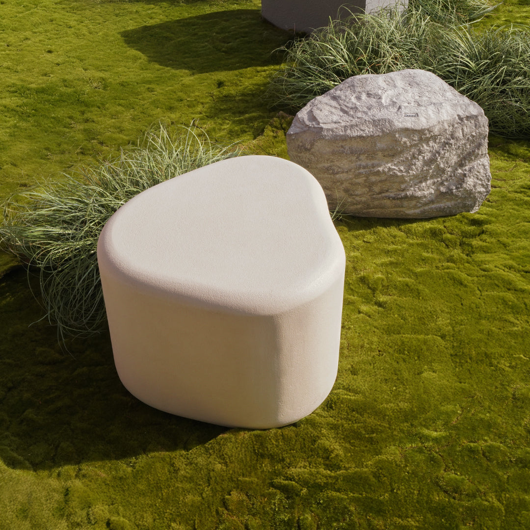 Beige planter box and seating bench from BEACON, made of durable material, ideal for outdoor garden or patio decor.