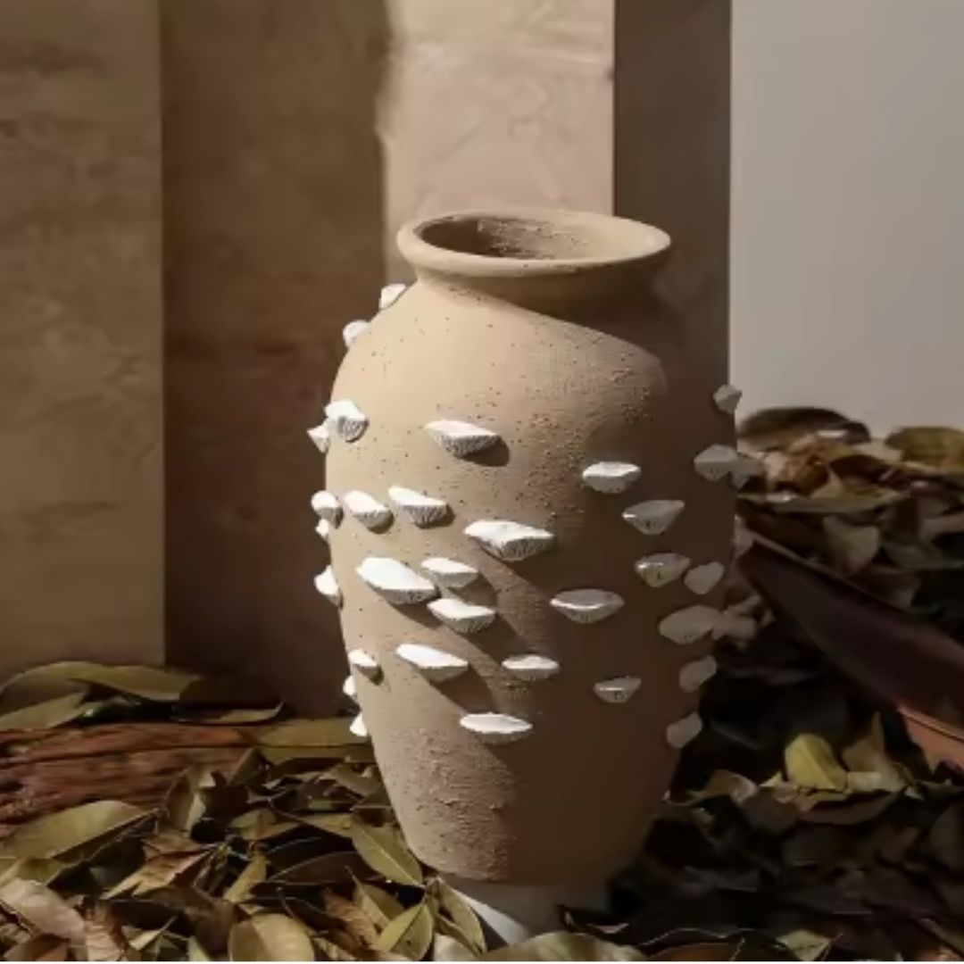 Beige and white cement vase with shell detail, decorative flower holder from BEACON Vases collection.