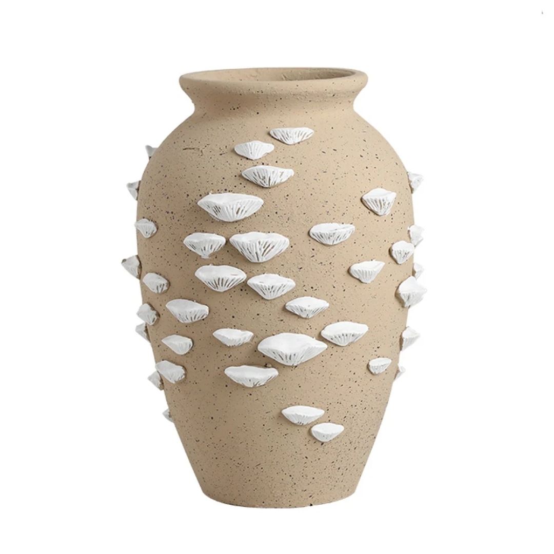 Beige and white cement vase with shell detail, decorative pottery from BEACON brand, perfect for coastal or modern decor.