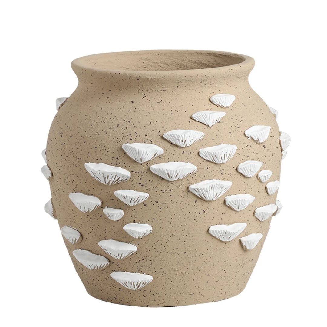 Beige and white cement vase with shell detail from BEACON, showcasing a stylish, textured design perfect for home decor.
