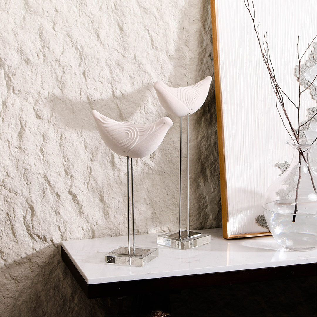 Large bird sculpture from BEACON home decor figurines collection, detailed carved design in neutral tones.