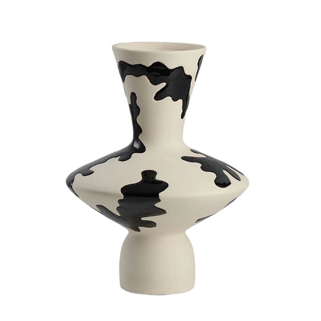 Black hand-painted vase by BEACON, featuring intricate brushstroke details and a sleek, modern design.