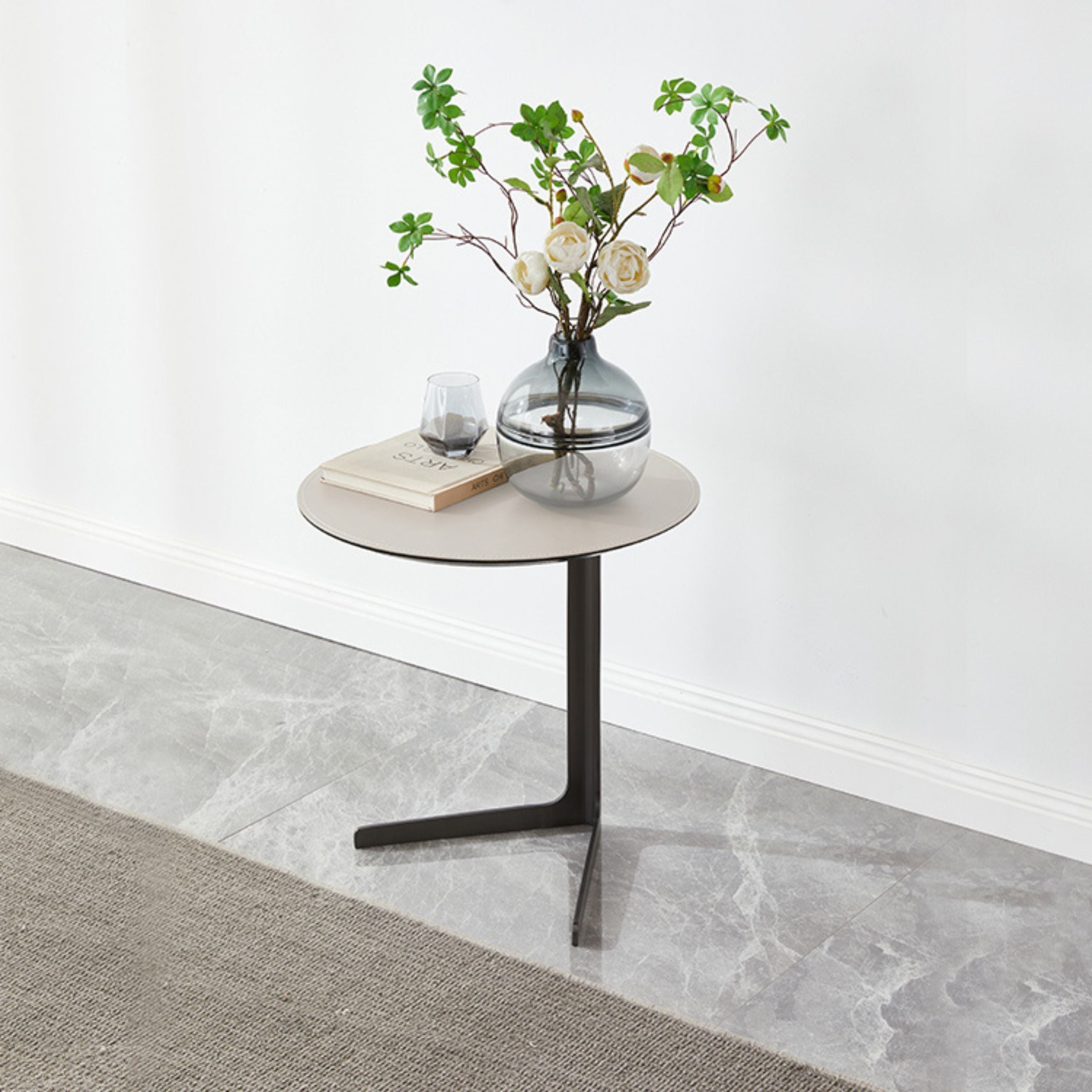Black saddle leather side table with black legs by BEACON, model MLL-D75 BL, featuring a sleek, modern design.