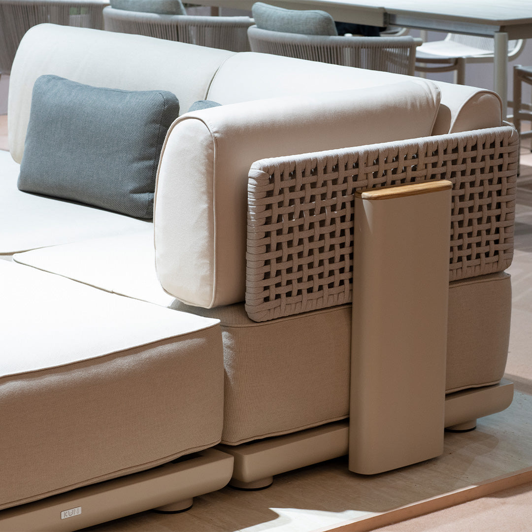 Outdoor single sofa unit with strap back by BEACON, featuring a modern block design for comfortable outdoor seating.