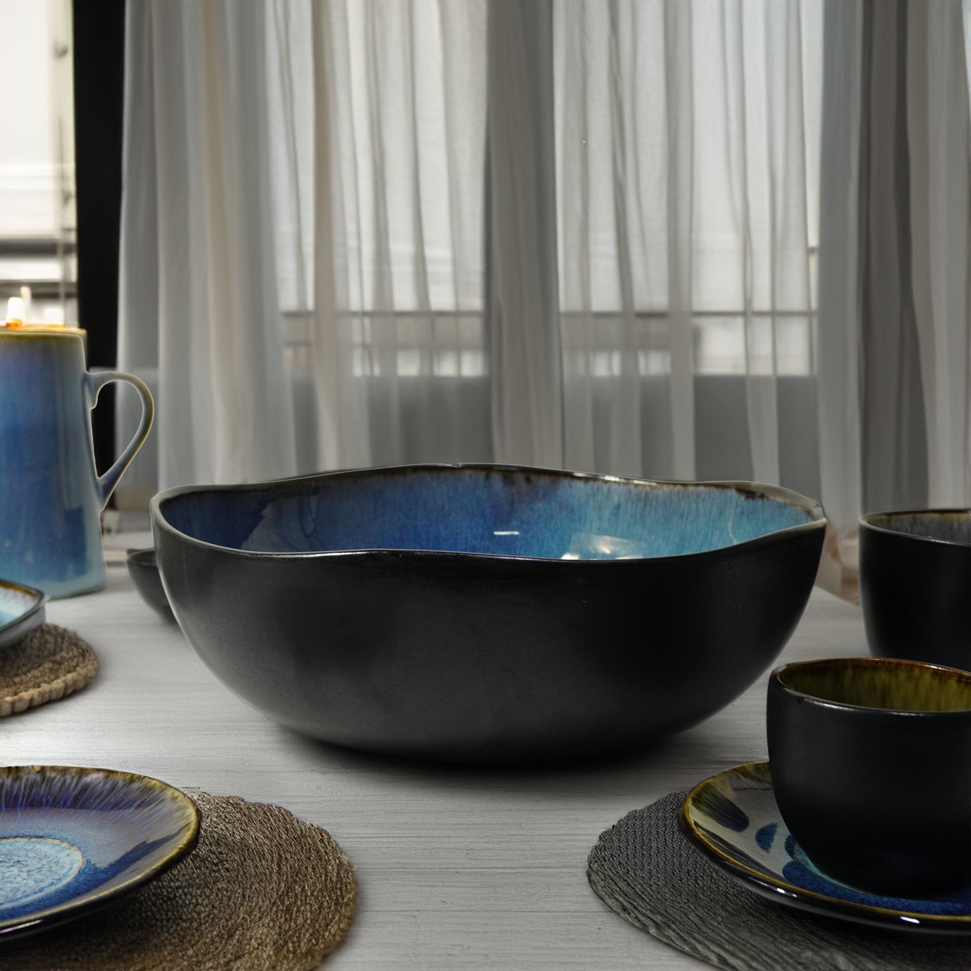 Blue Wave Big Bowl by BEACON, black and blue ceramic bowl with wave design, ideal for serving or display.