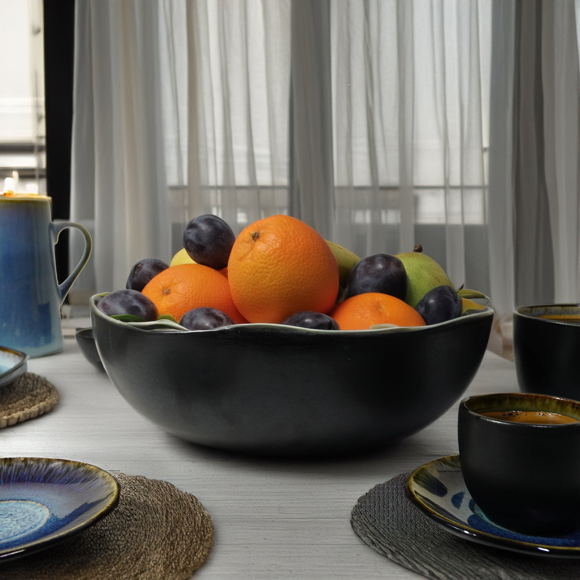 Blue Wave Big Bowl by BEACON, black and blue ceramic bowl with wave design, ideal for serving or decorative use.